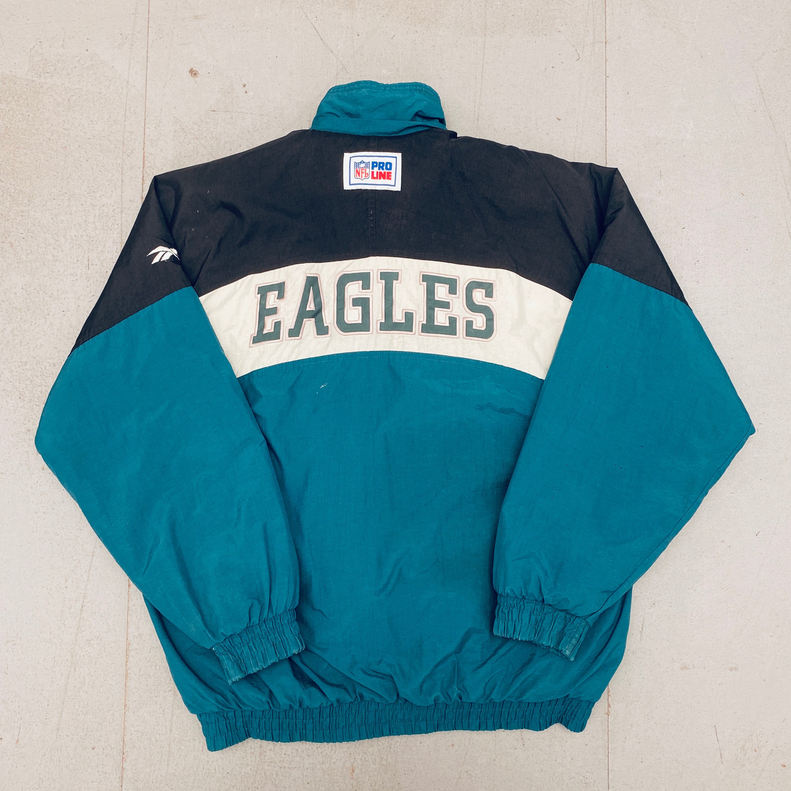 Philadelphia Eagles 1990s Reebok Reverse Spellout Full-Zip Proline Jacket for Men - Vintage NFL Football Fan Gear for Game Day & Casual Wear