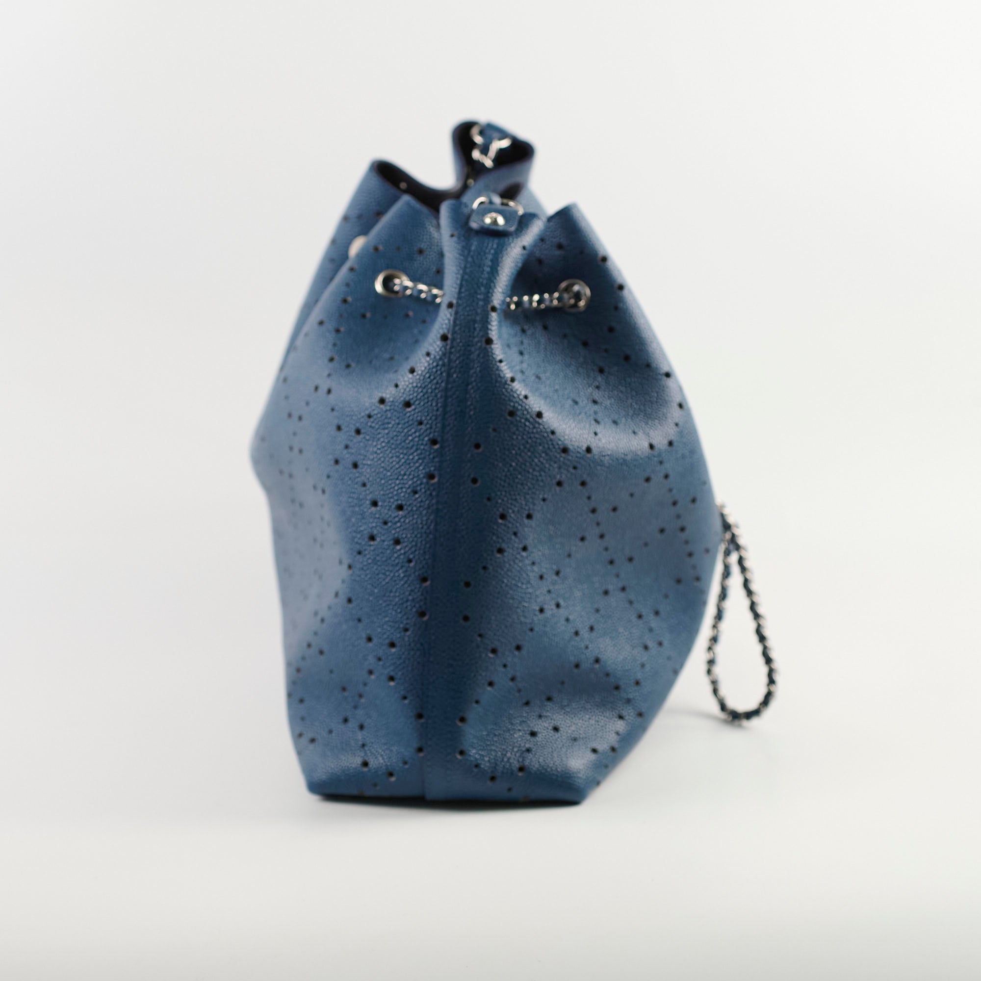 Chanel Perforated Drawstring Bucket Bag in Blue | Luxury Designer Handbag for Women | Perfect for Casual Outings & Beach Vacations