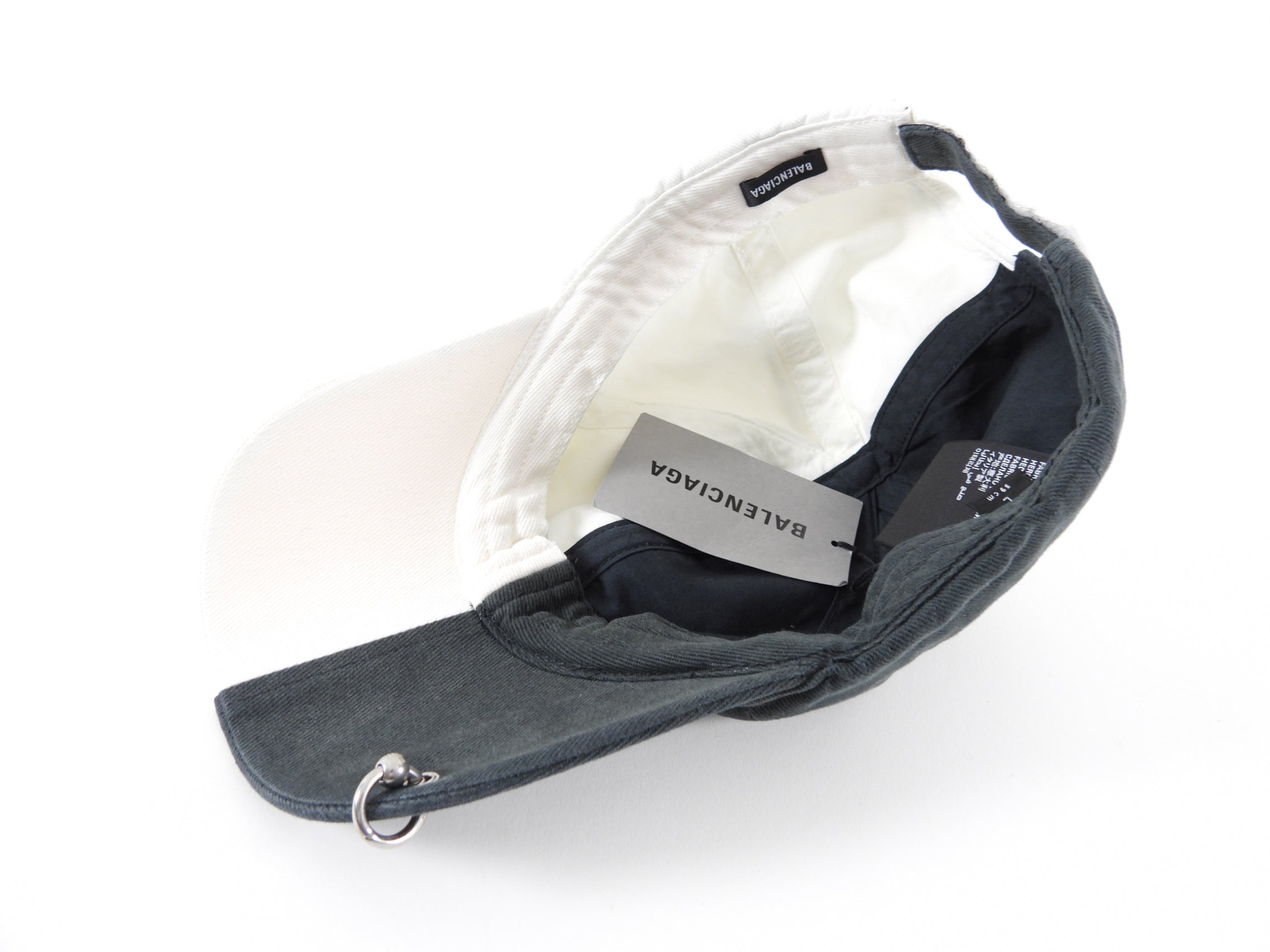 Balenciaga Dark Grey & White 50/50 Logo Piercing Hat - Unisex Baseball Cap for Streetwear Fashion & Urban Lifestyle