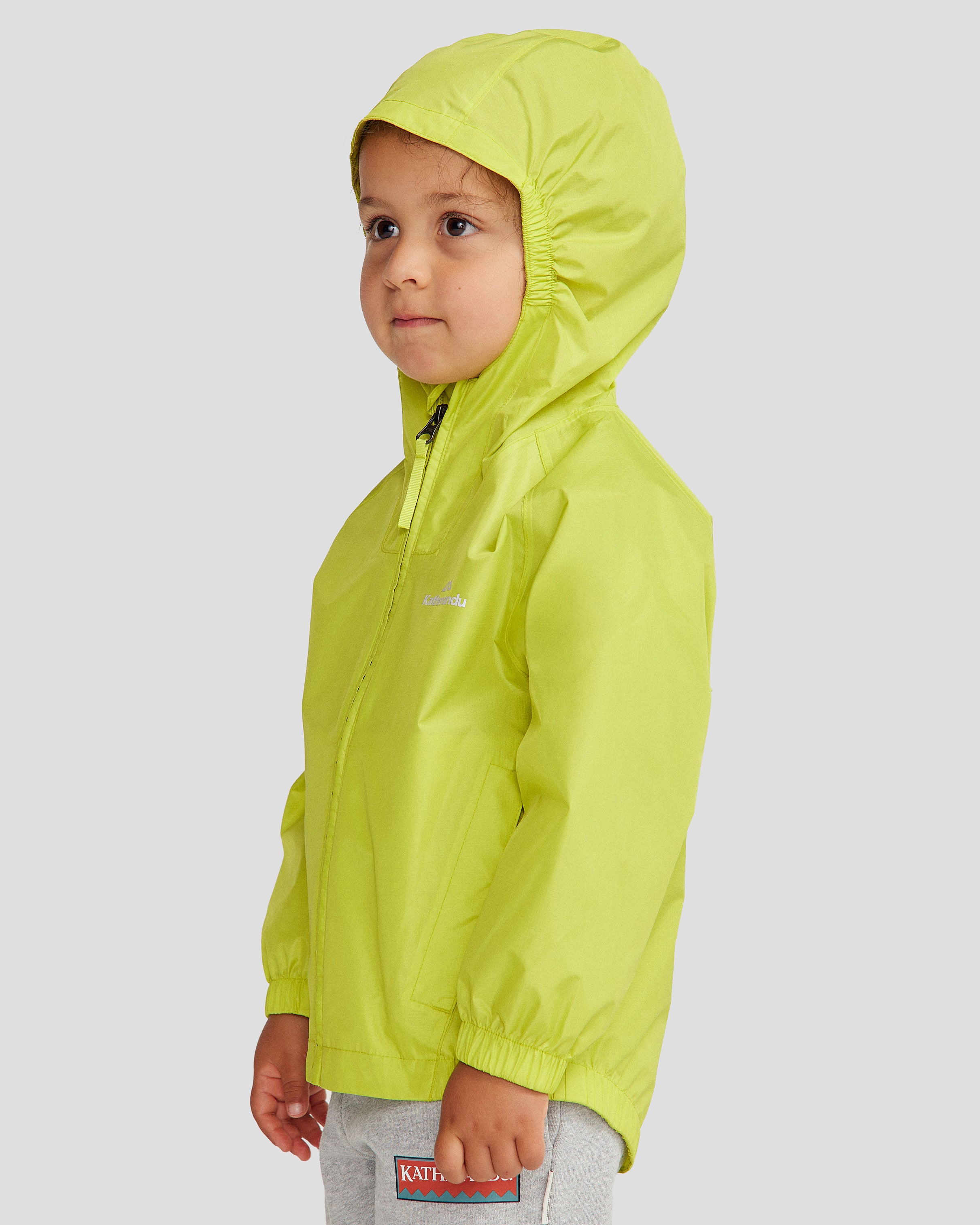 Kids Pocket it 2L Waterproof Rain Jacket v4 - Bright Moss Green | Lightweight Outdoor Raincoat for Hiking, School & Play