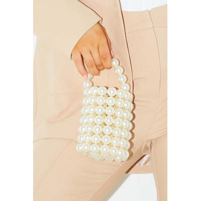 The Elegance of the Night: A Story of the Crocodile Embossed Clutch Bag