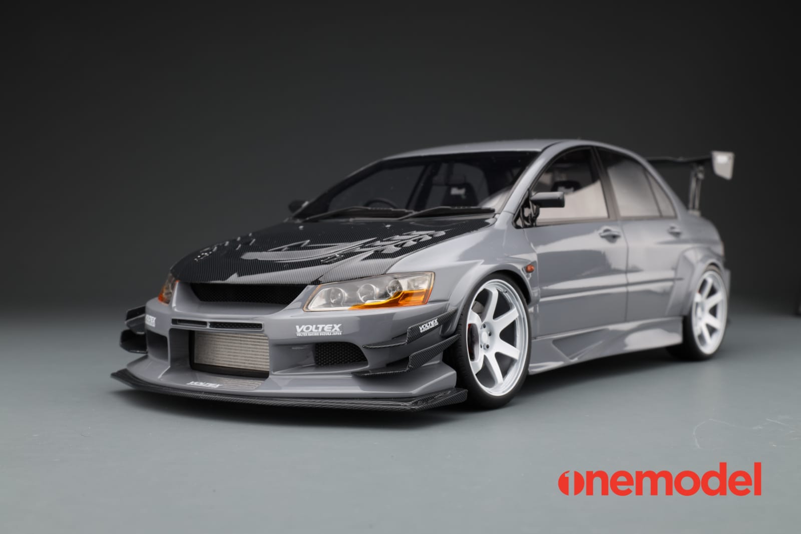 1:18 Scale Mitsubishi Lancer Evolution IX Voltex Model Car with Carbon Fiber Hood - Cement Gray Color - Perfect for Diecast Collectors, Car Enthusiasts, and Home/Office Display
