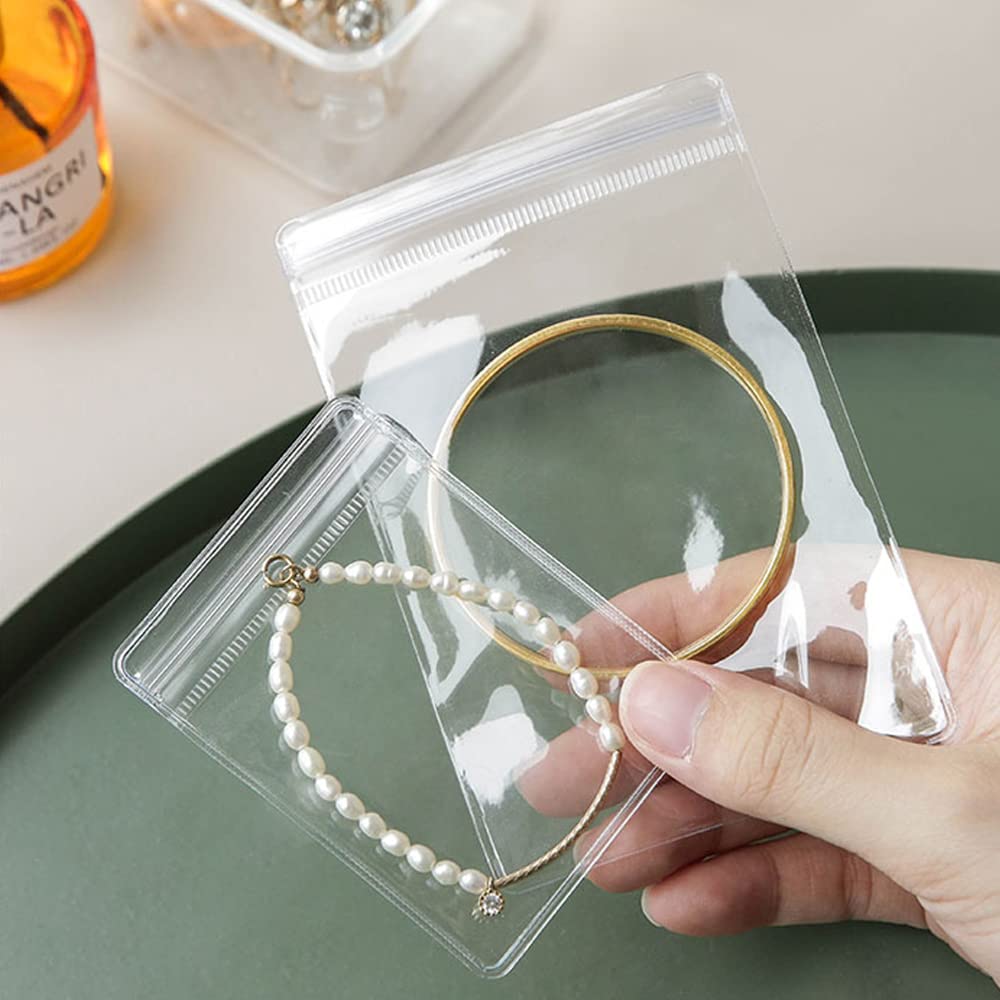 150PCS Clear Plastic Jewelry Storage Bags - Small Ziplock PVC Pouches for Rings, Earrings & Necklaces - Organize & Protect Your Jewelry Collection at Home or Travel