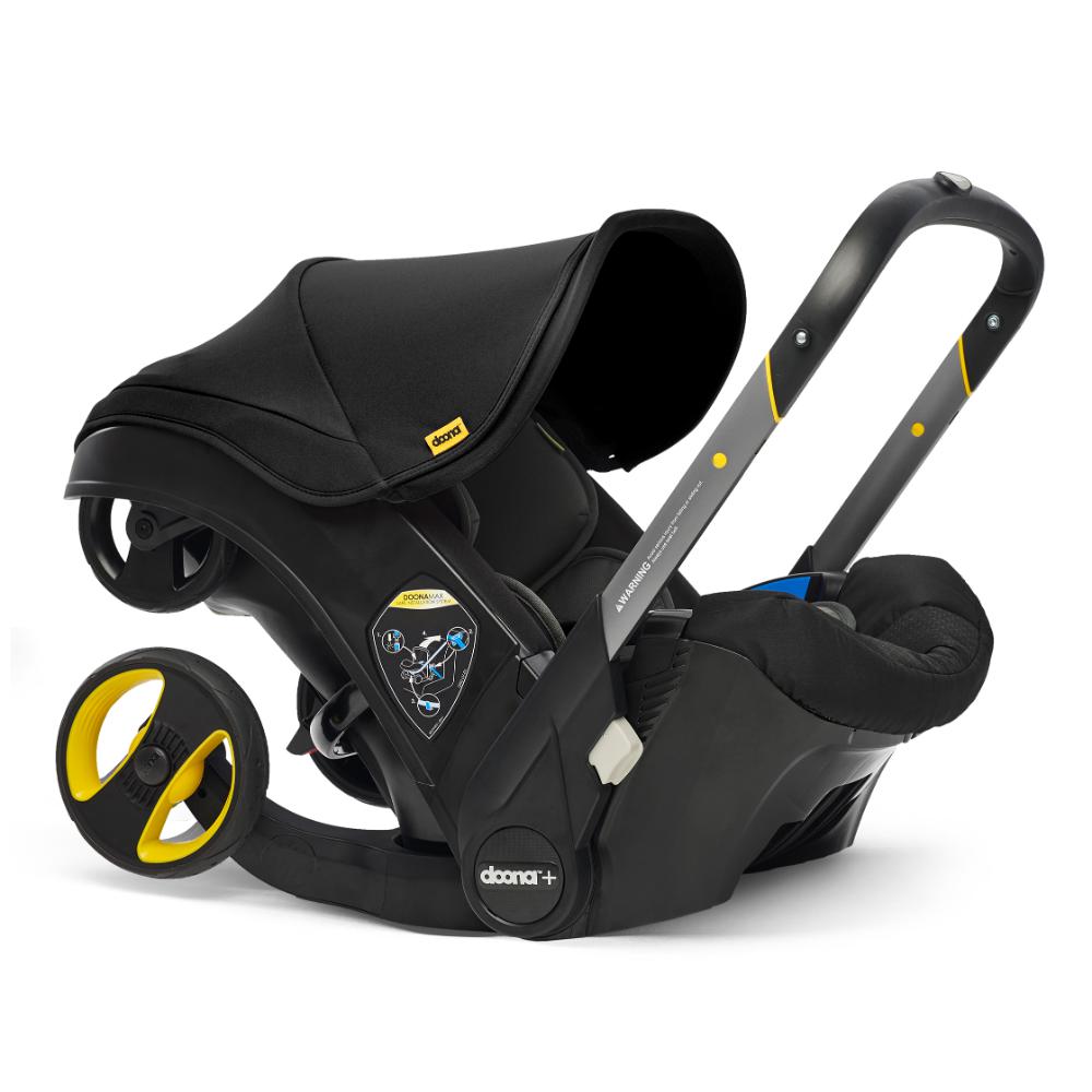 Doona Infant Car Seat & Stroller with Base in Nitro Black - Safe & Convenient Travel System for Newborns to Toddlers - Perfect for Air Travel, Road Trips, and Everyday Use