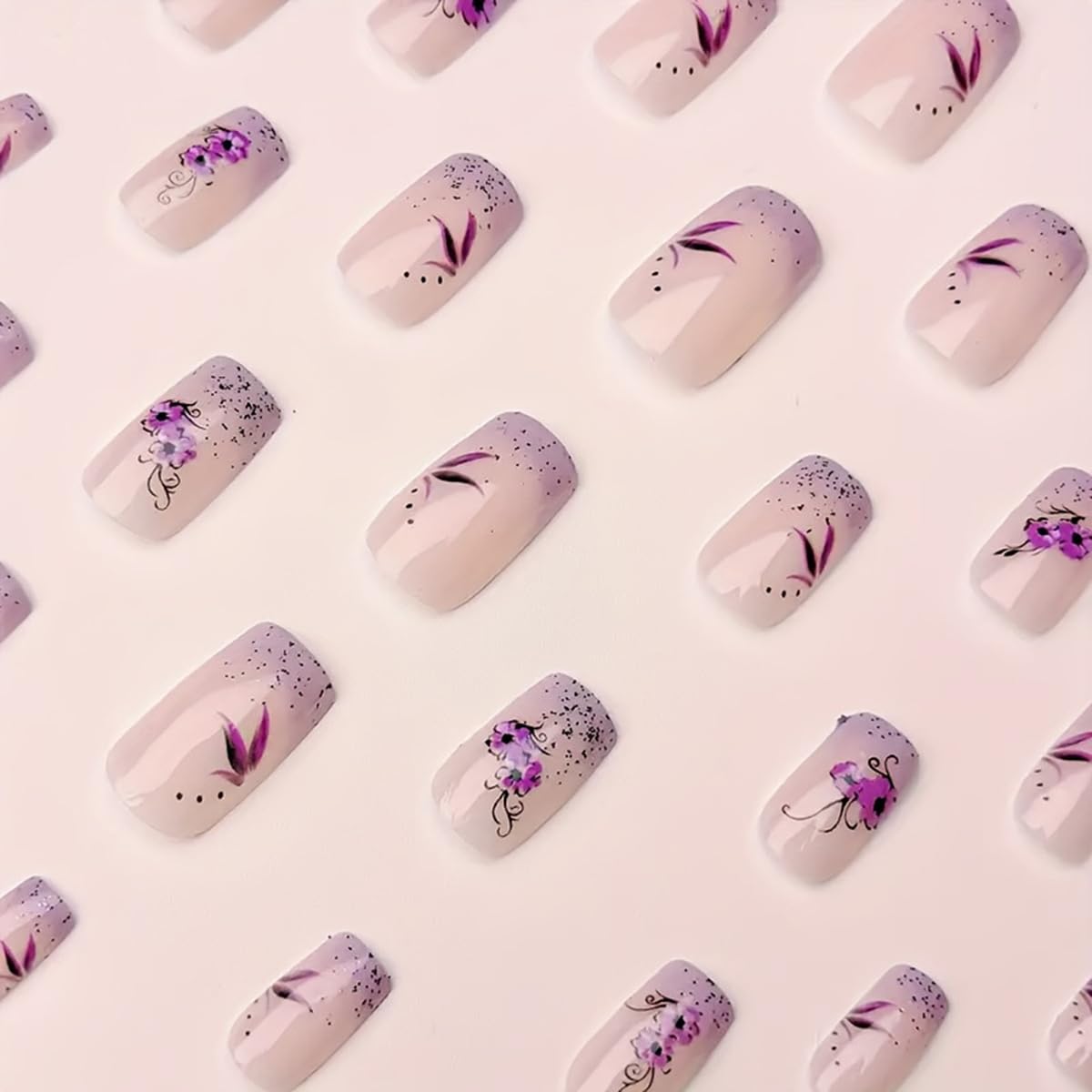 Purple French Press on Nails Short Square Fake Nails - 24PCS Nude False Nails with Purple Flower Glitter Design, Full Cover Acrylic Glue on Nail Tips for Women | Perfect for Parties, Weddings & Daily Wear