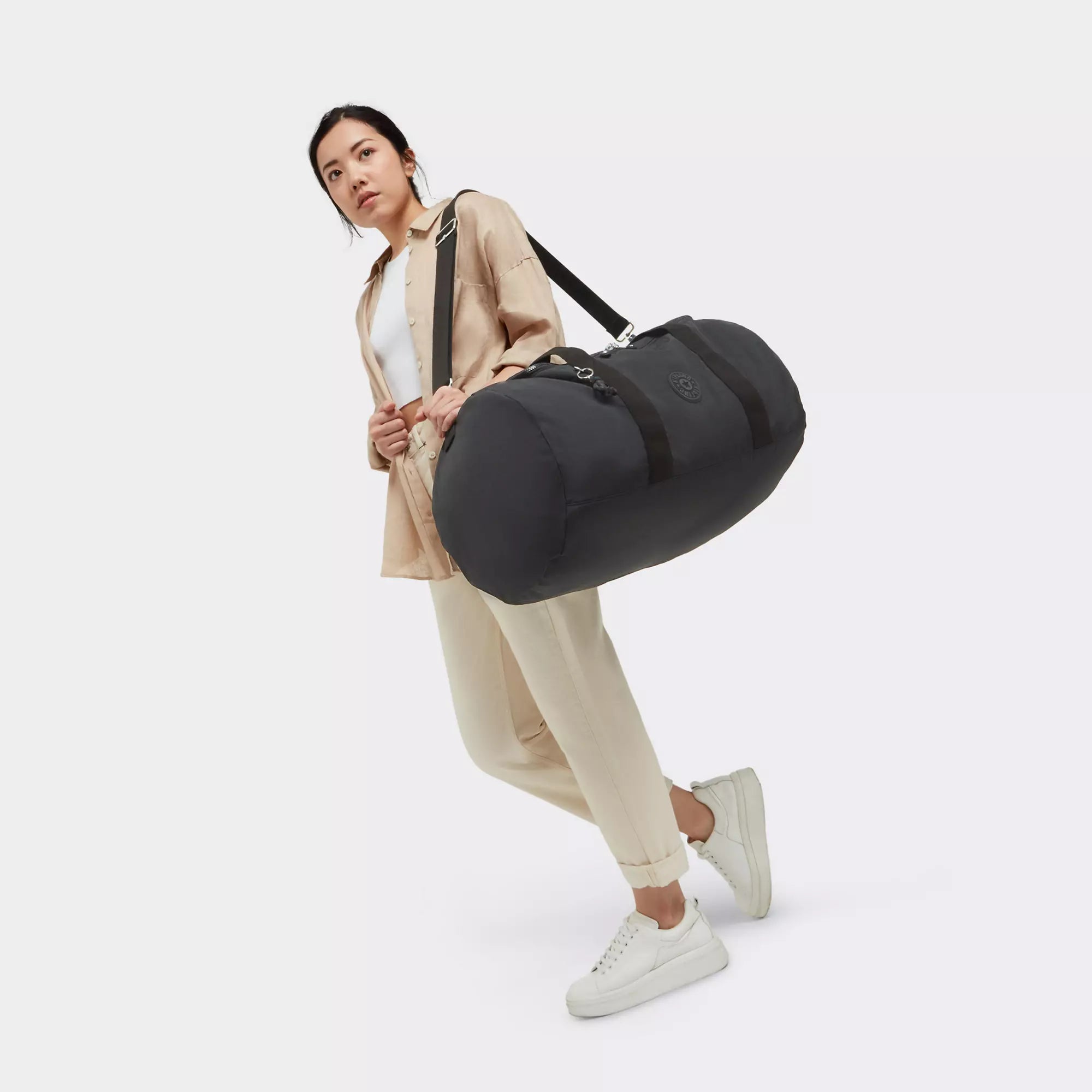 Kipling Argus Medium Duffle Bag - Lightweight Travel Duffel for Women & Men, Water-Resistant Black Backpack for Gym, Weekend Trips & Carry-On Luggage