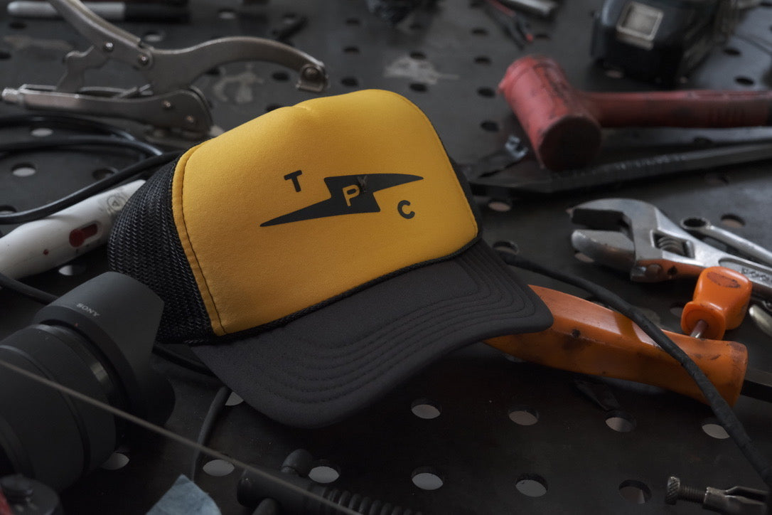 TPC Bolt Meshback Trucker Hat - Black & Gold Adjustable Snapback Cap for Men & Women | Perfect for Outdoor Activities, Sports, and Casual Wear