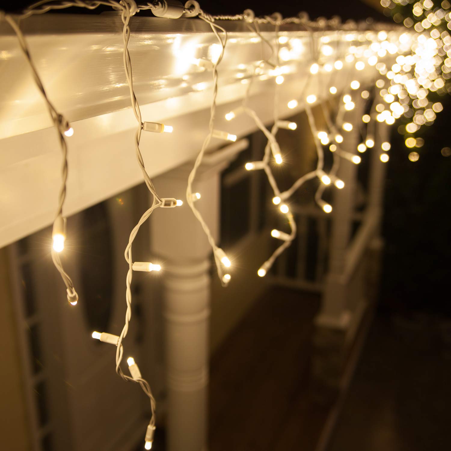 70 5mm Warm White LED Icicle Christmas Lights - 7ft White Wire Outdoor String Lights for Christmas Decorations, Wedding, Party, Home & Bedroom Decor - Energy Efficient Waterproof Holiday Lighting for Roof, Trees & Indoor Decor