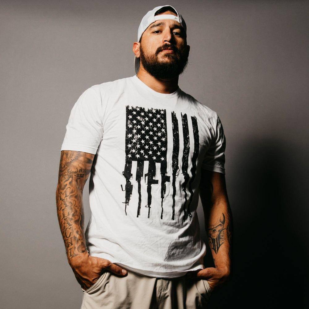 Rifle Flag T-Shirt - Patriotic American Flag Gun Design - White Cotton Tee for Men & Women - Perfect for 2A Supporters, Shooting Range, and Outdoor Activities
