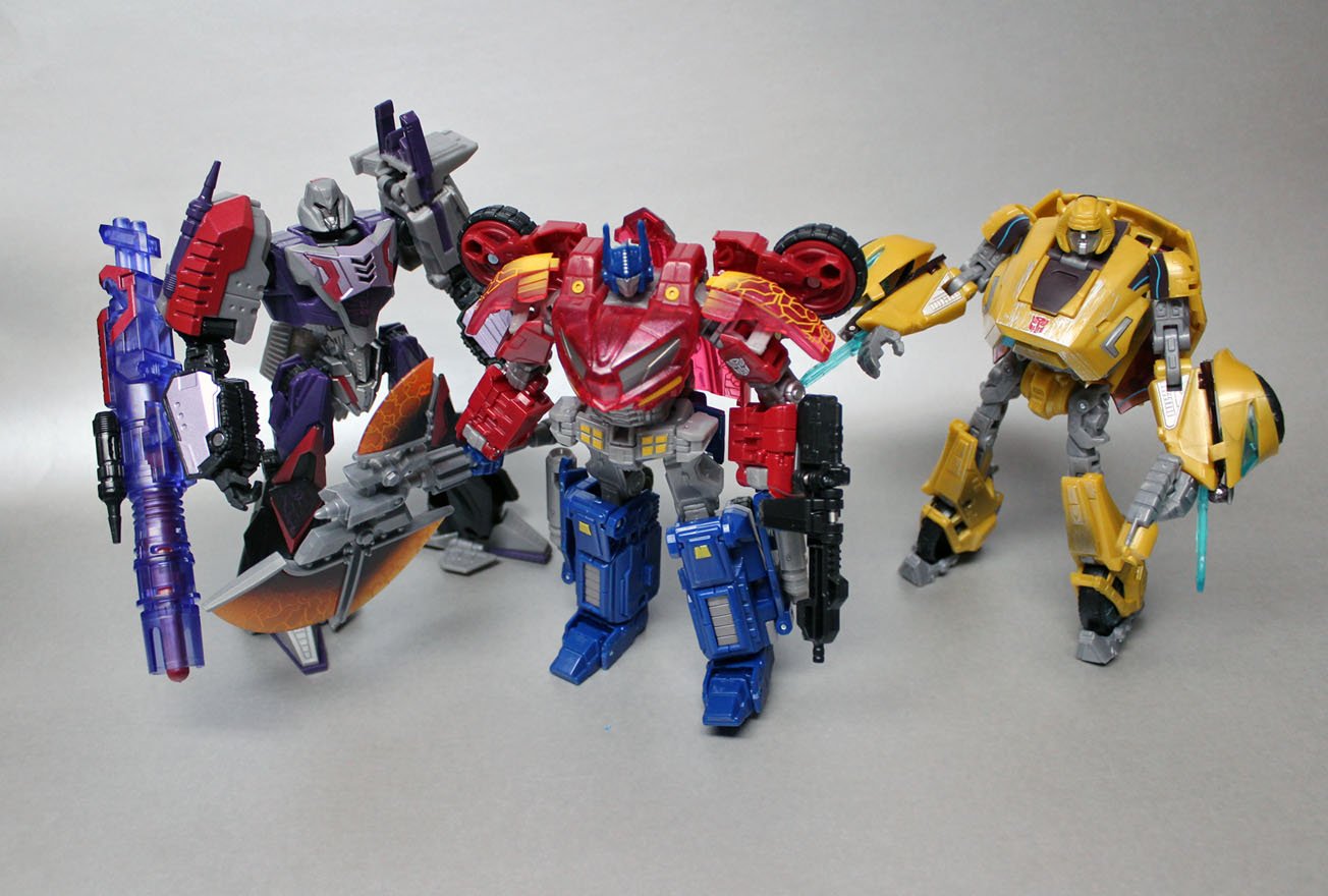 Transformers Generations Rage Over Cybertron Action Figures - Deluxe Cybertronian Optimus Prime, Bumblebee & Megatron Set - Collectible Robot Toys for Kids & Adults - Perfect for Display, Play & Gifts