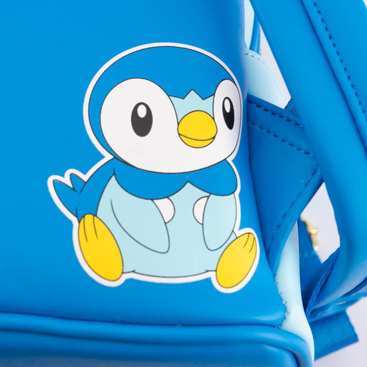 Loungefly Pokemon Piplup Cosplay Women's Double Strap Shoulder Bag Purse - Cute Anime Backpack for Collectors, Conventions & Everyday Use