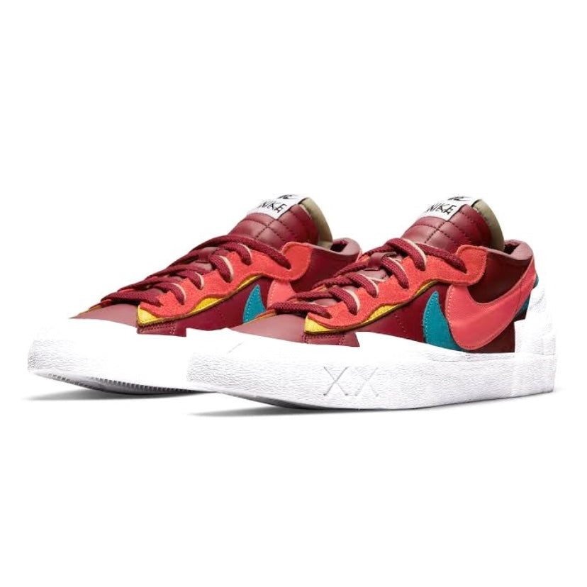KAWS x Nike x Sacai Blazer Low Sneakers - Team Red/Hot Lava/White Colorway - Limited Edition Collaboration Shoes for Streetwear & Sneaker Collectors