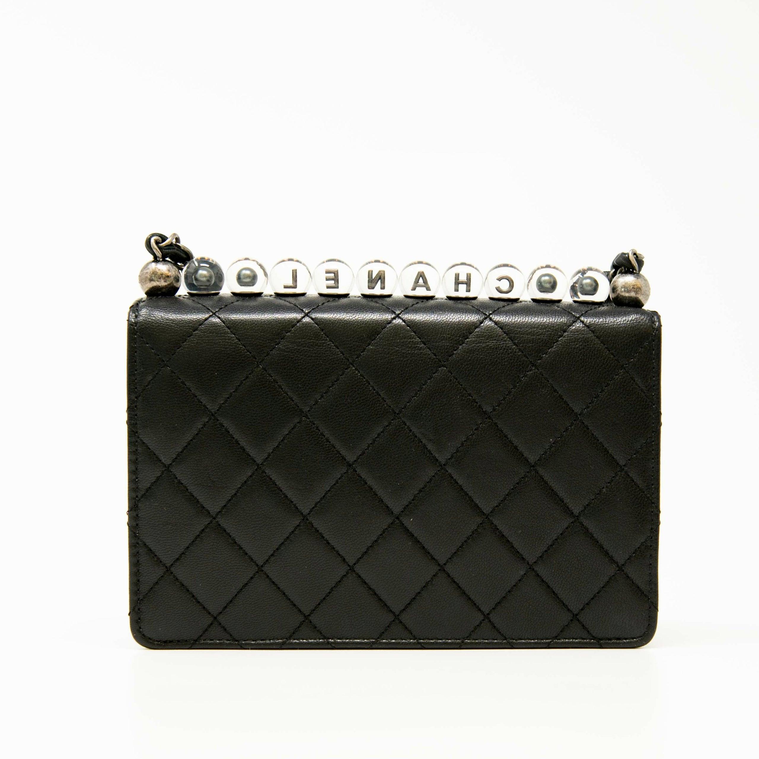 Chanel Black Lambskin Quilted Bag with Pearl CC Logo - Luxury Crossbody Flap Purse for Women, Perfect for Evening Parties & Date Nights