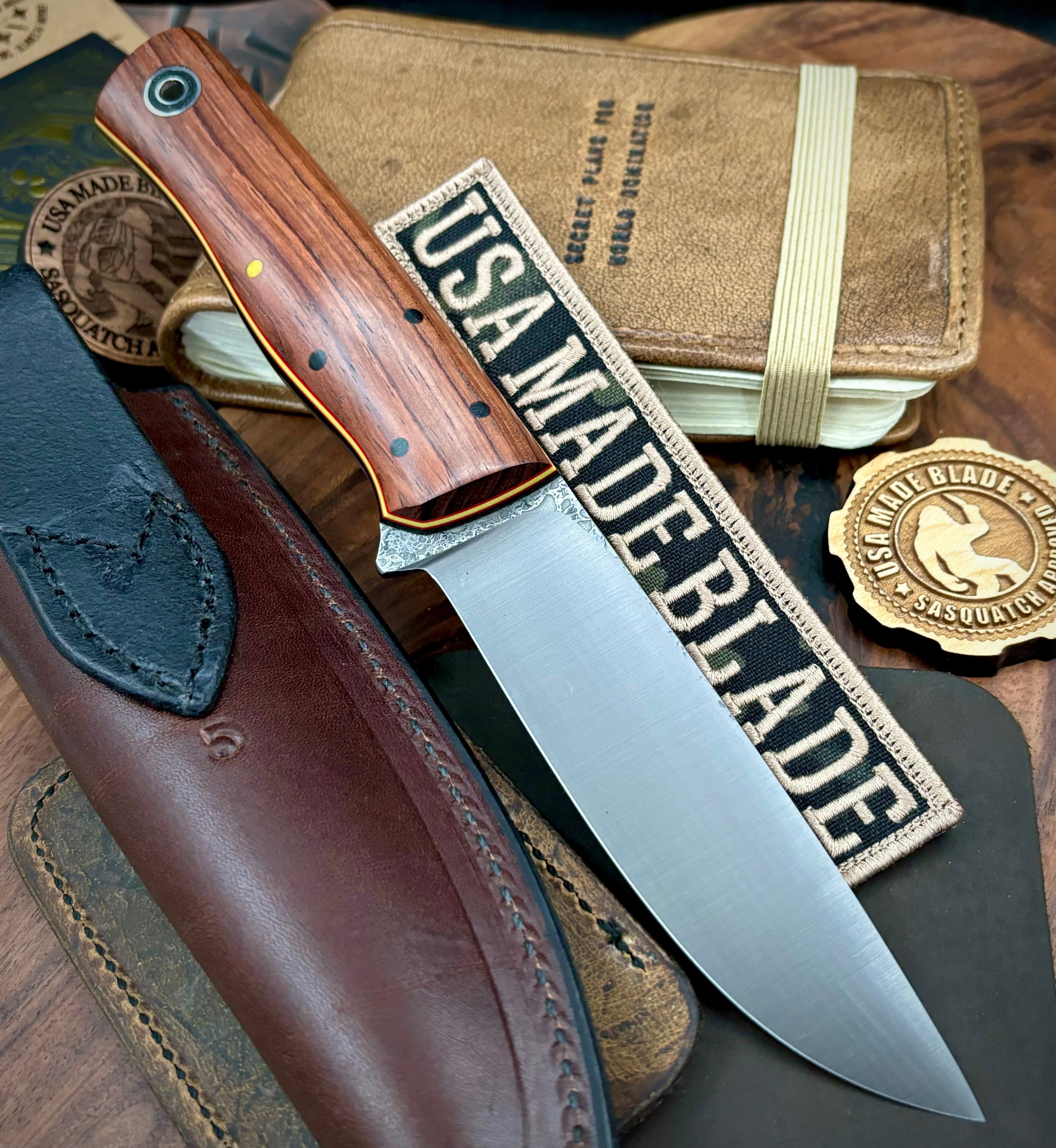 Fiddleback Forge Leuku Knife - 1084 Steel Blade with Honduran Rosewood Handle, Black Liners & Red/Yellow Stripes - Perfect for Bushcraft, Camping, and Outdoor Survival