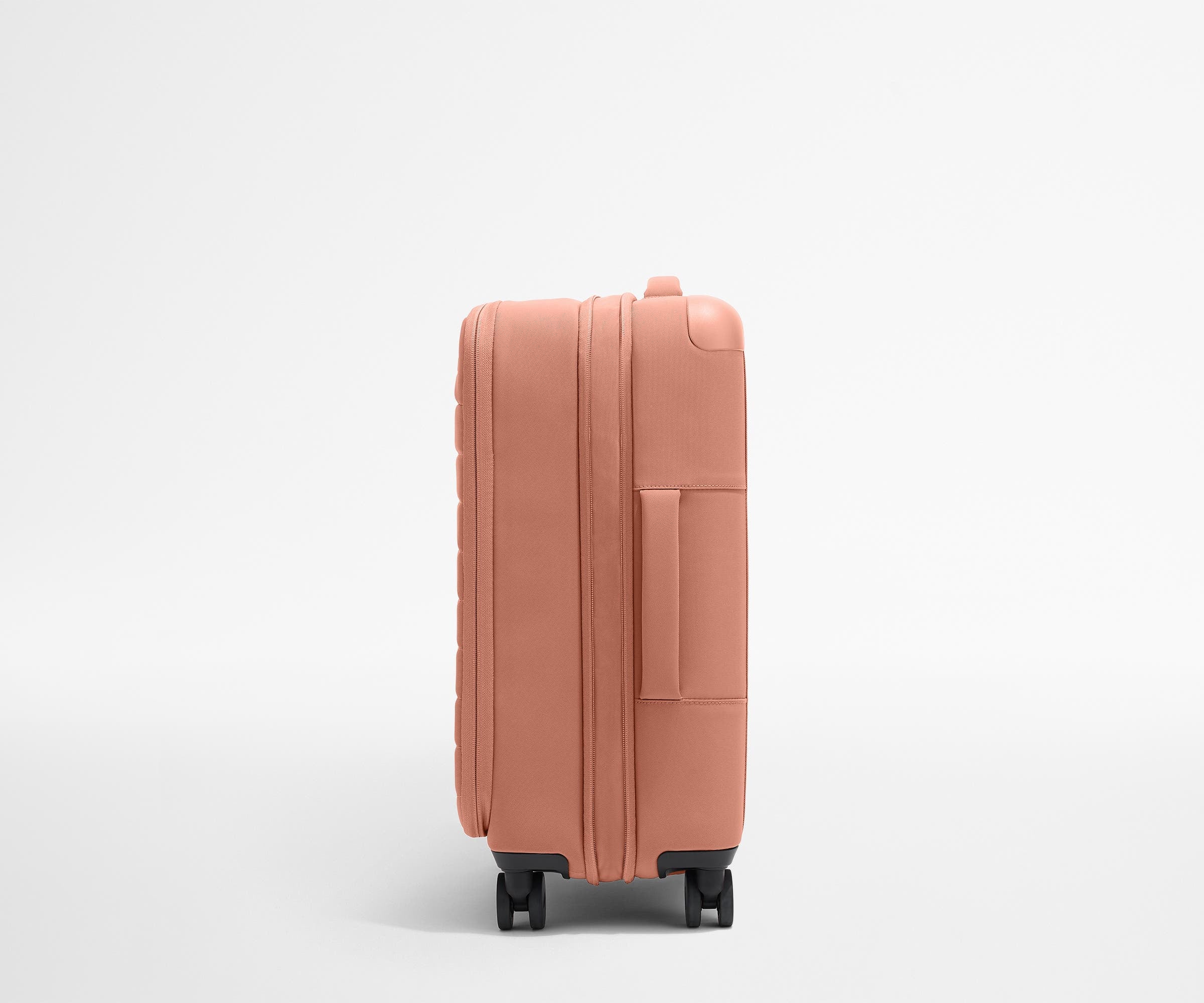 Softside Bigger Carry On Luggage in Clay Pink - Lightweight Spinner Suitcase for Women & Men, Perfect for Air Travel & Weekend Getaways