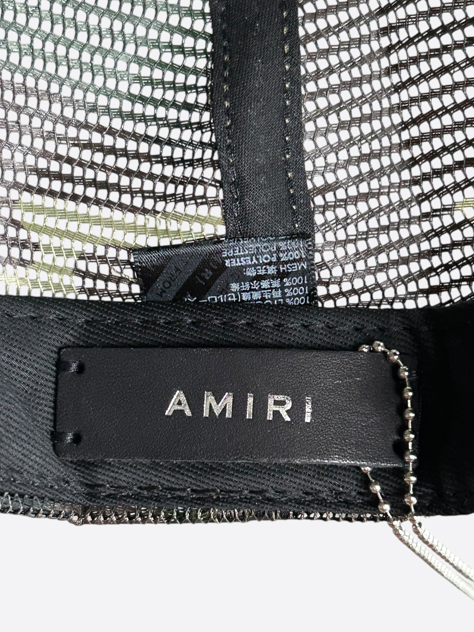 Amiri Camouflage & Orange Stencil Logo Trucker Hat - Stylish Streetwear Cap for Men, Fashionable Camo Design - Perfect for Urban Outfits, Music Festivals & Casual Wear