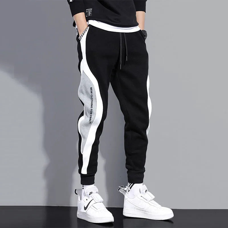 **Men's Wide Loose Casual Pants - Elastic Waist, Breathable Patchwork Nine-Point Trousers for Sports & Outdoor Activities | Perfect for Jogging, Travel, and Everyday Wear**