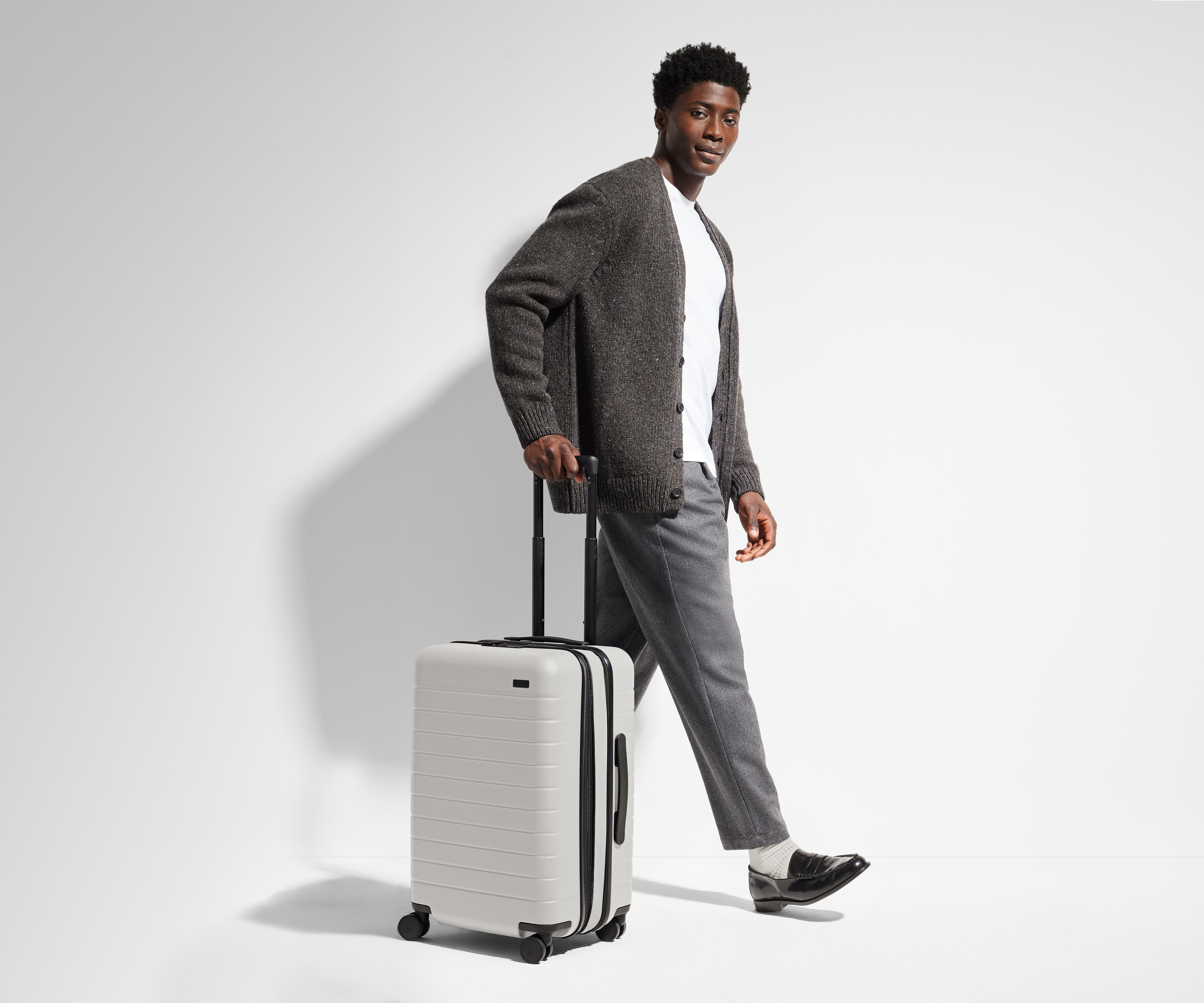 The Bigger Carry On Flex Suitcase in Cloud Gray - Lightweight Expandable Luggage for Travel, Business Trips & Weekend Getaways