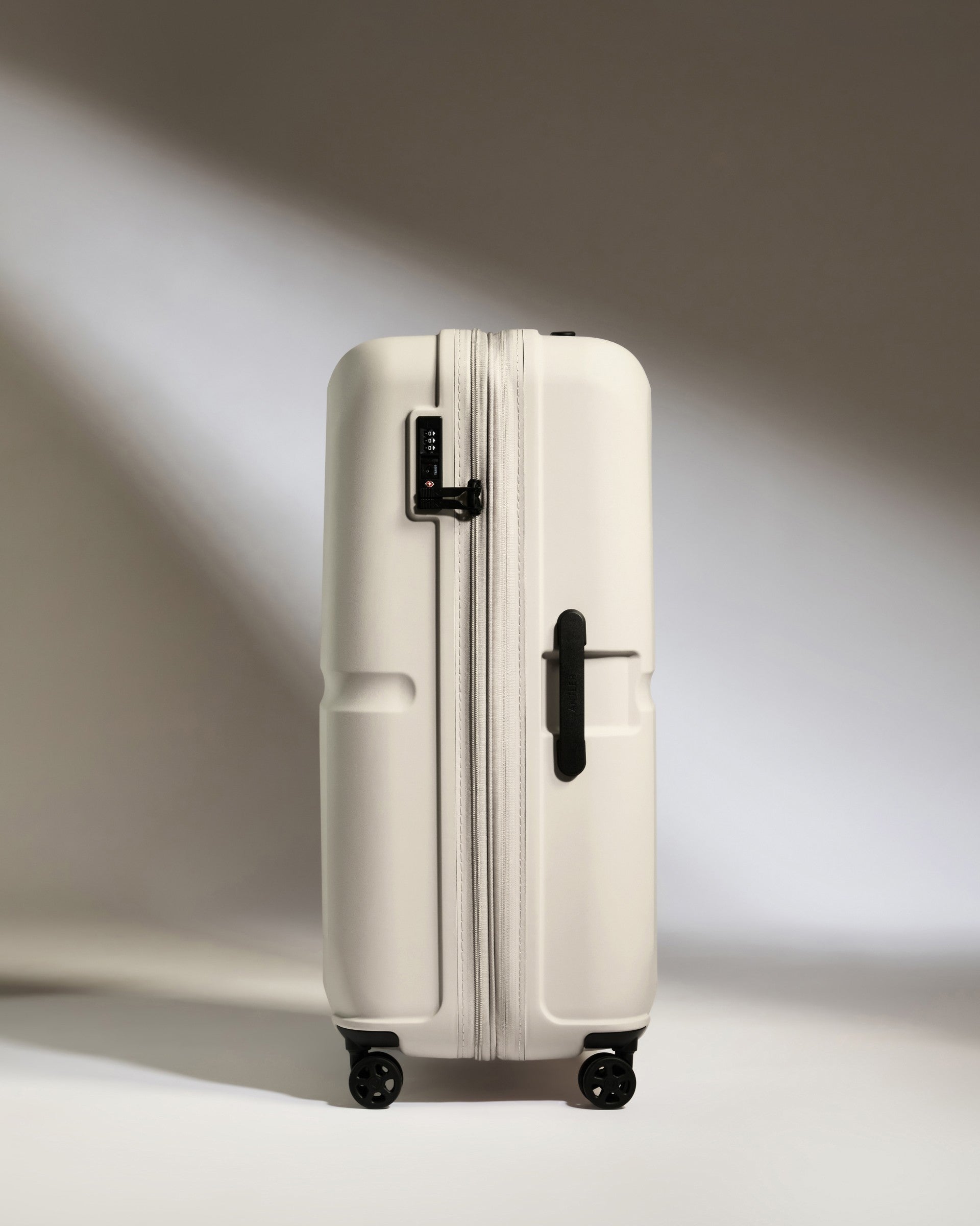 Large Taupe Luggage with Single Stripe - Spacious Travel Suitcase for Business Trips & Vacations