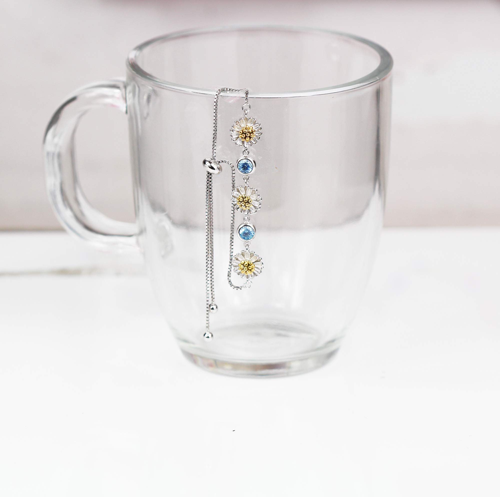 Kaguya Sterling Silver Daisy Bracelet for Women - Adjustable Infinity Bracelet with Blue Zirconia Blossom, Dainty Friendship Jewelry Gift for Her - Perfect for Birthday, Anniversary & Everyday Wear