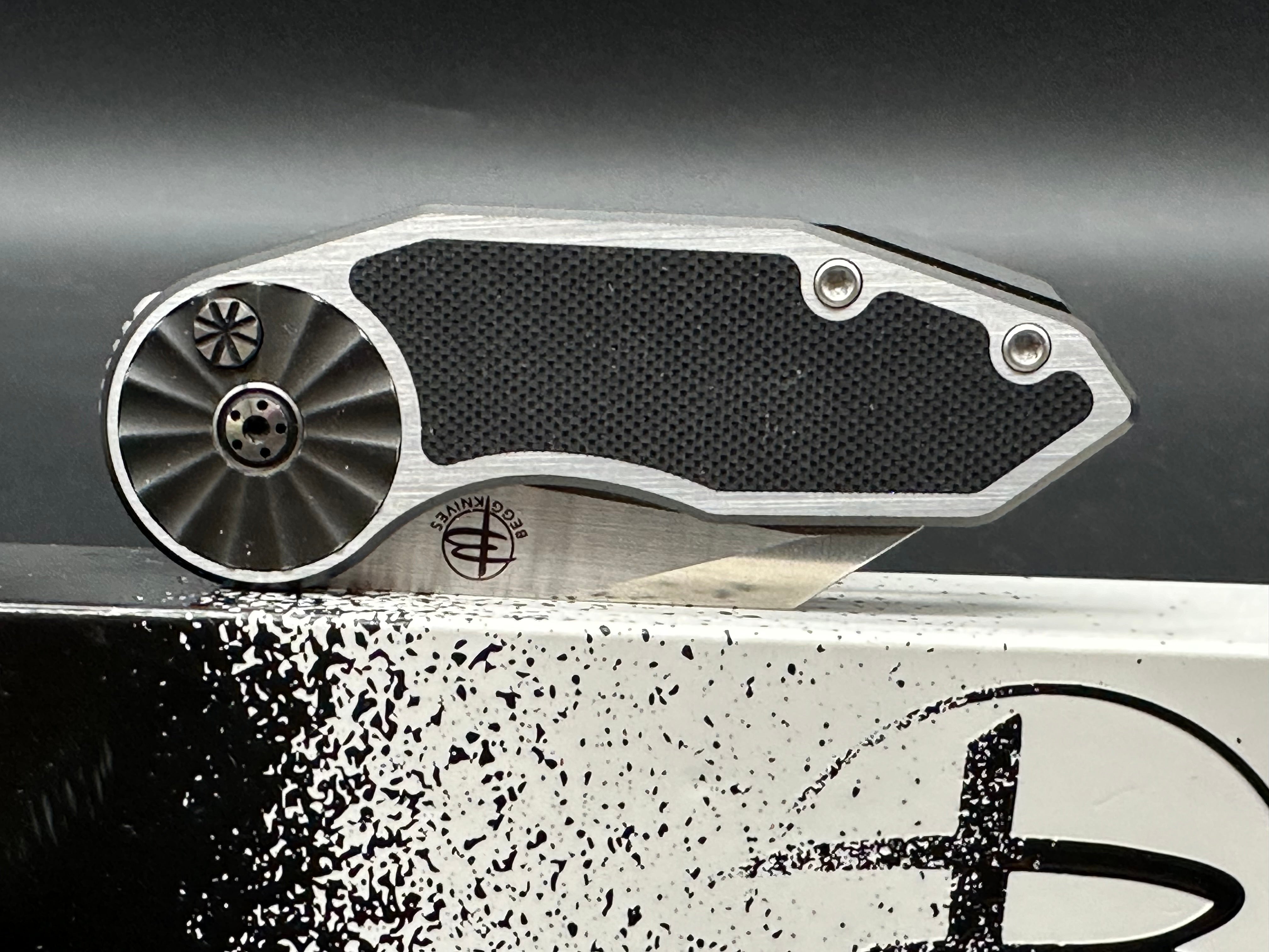 Begg Knives Micro Burst Rosette Button Lock Folding Knife - Aluminum & Black G10 Handle - EDC Pocket Knife for Camping, Hiking, and Outdoor Adventures