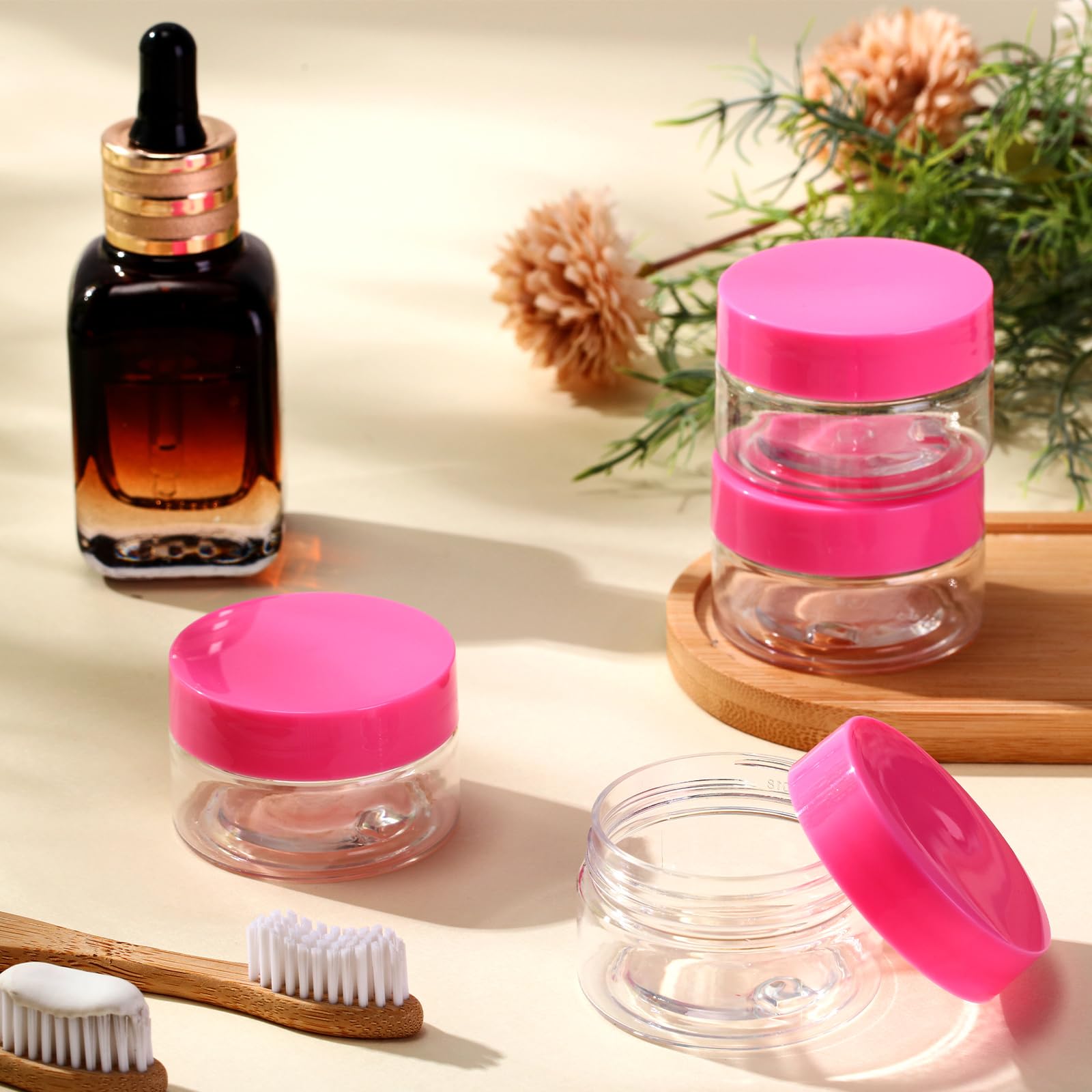 SATINIOR 100-Pack 1 oz Clear Plastic Jars with Pink Lids - Small Wide Mouth Containers for Lotion, Cream, Body Butter, Rhinestones & Travel Storage - Perfect for DIY Crafts, Beauty Products & Organizing Small Items