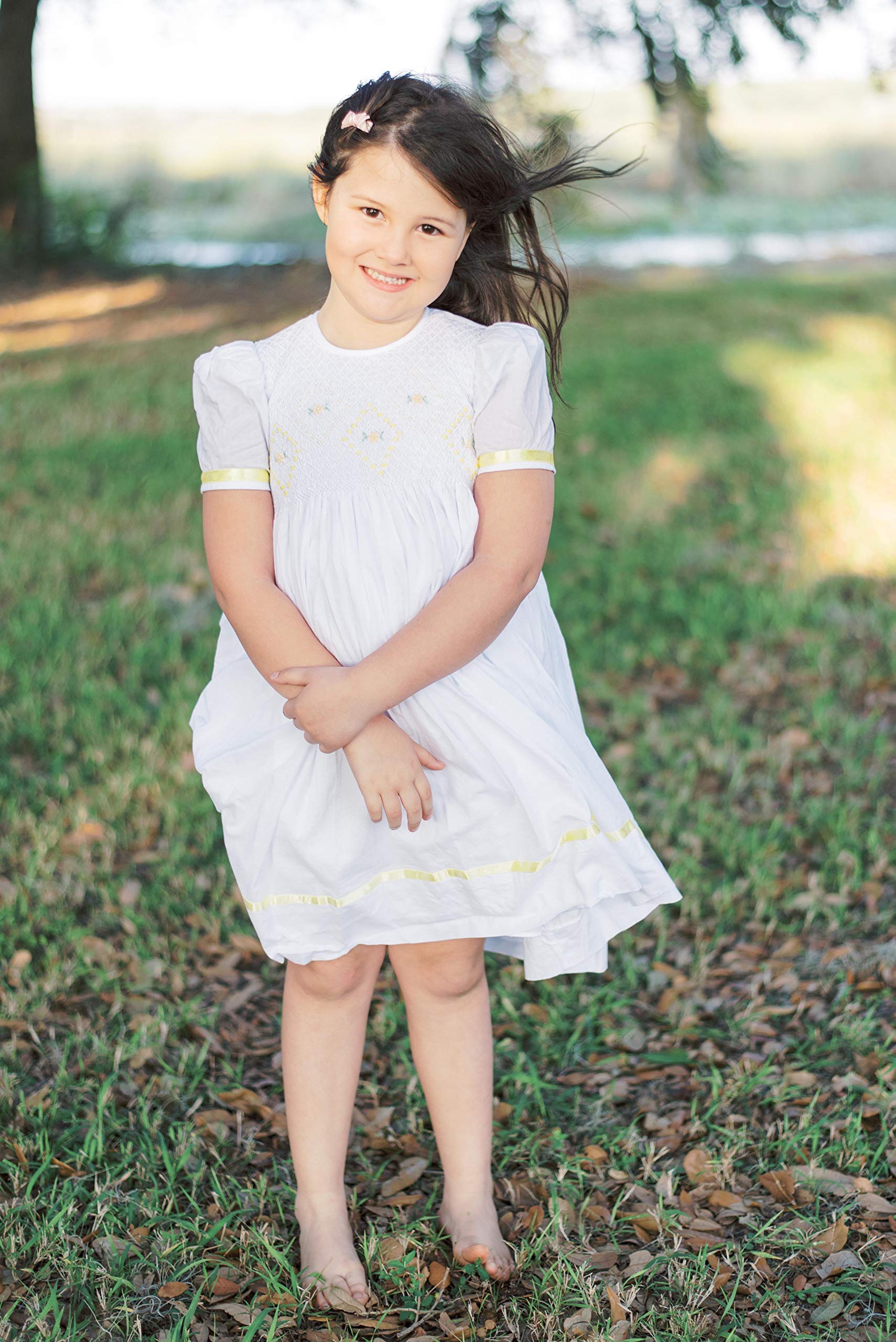Elegant Hand-Smocked White Easter Dress for Flower Girls with Yellow Ribbon - Perfect for Easter Celebrations, Weddings & Special Occasions