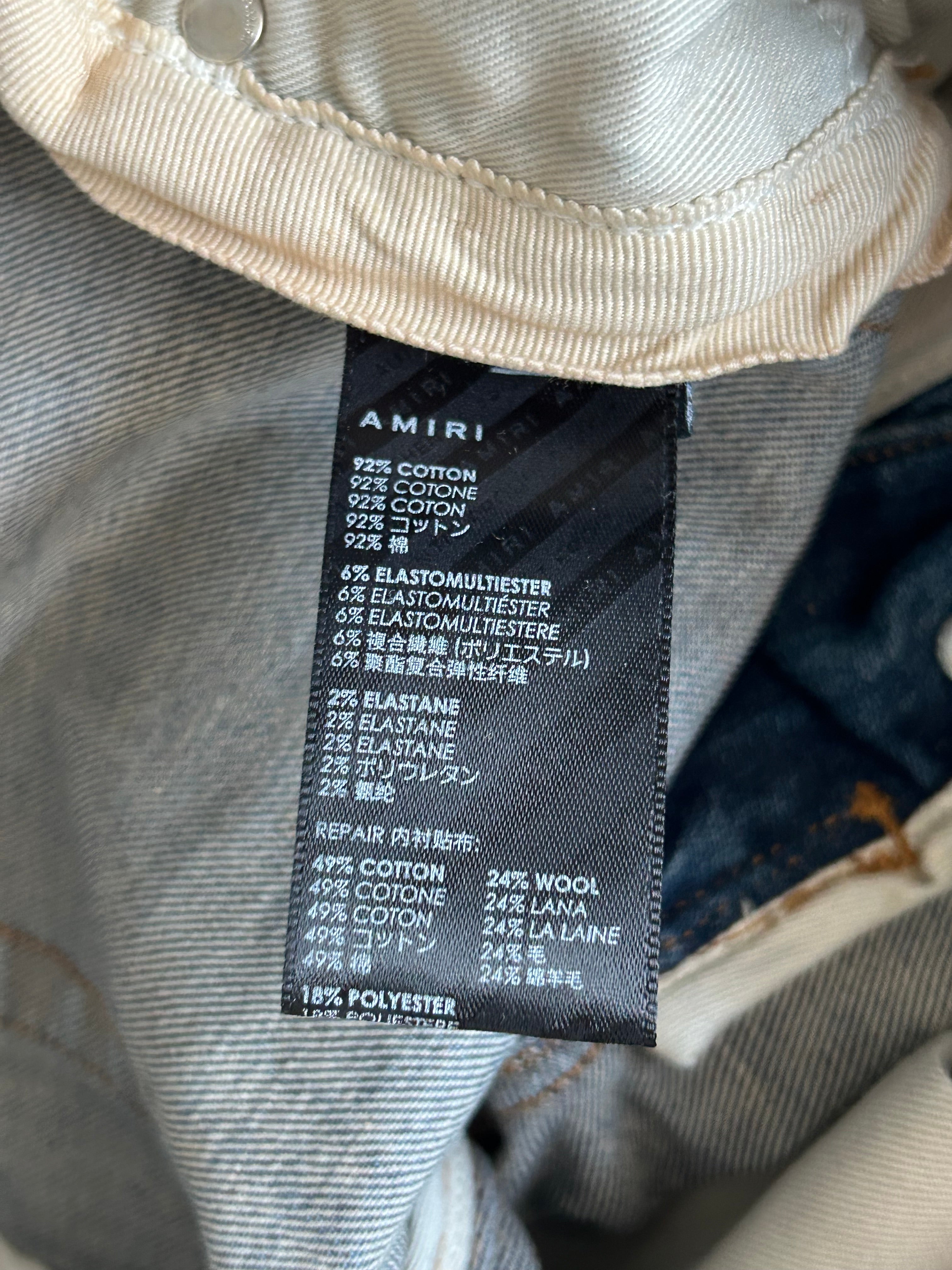Amiri Blue MA Repair Patch MX1 Jeans - Distressed Denim Pants for Men | Stylish Ripped Skinny Jeans for Casual Wear & Night Out