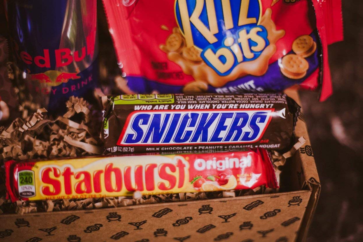 Ultimate College Care Package BroBox for Men - Snack Gift Box with Cookies, Candy, Chips, Popcorn, Jerky & Protein Snacks | Perfect for Dorm Life, Get Well Gifts, Teen Boys & Camp Care Packages | Great for Finals Week, Birthday Surprises & Long-Distance Friendships