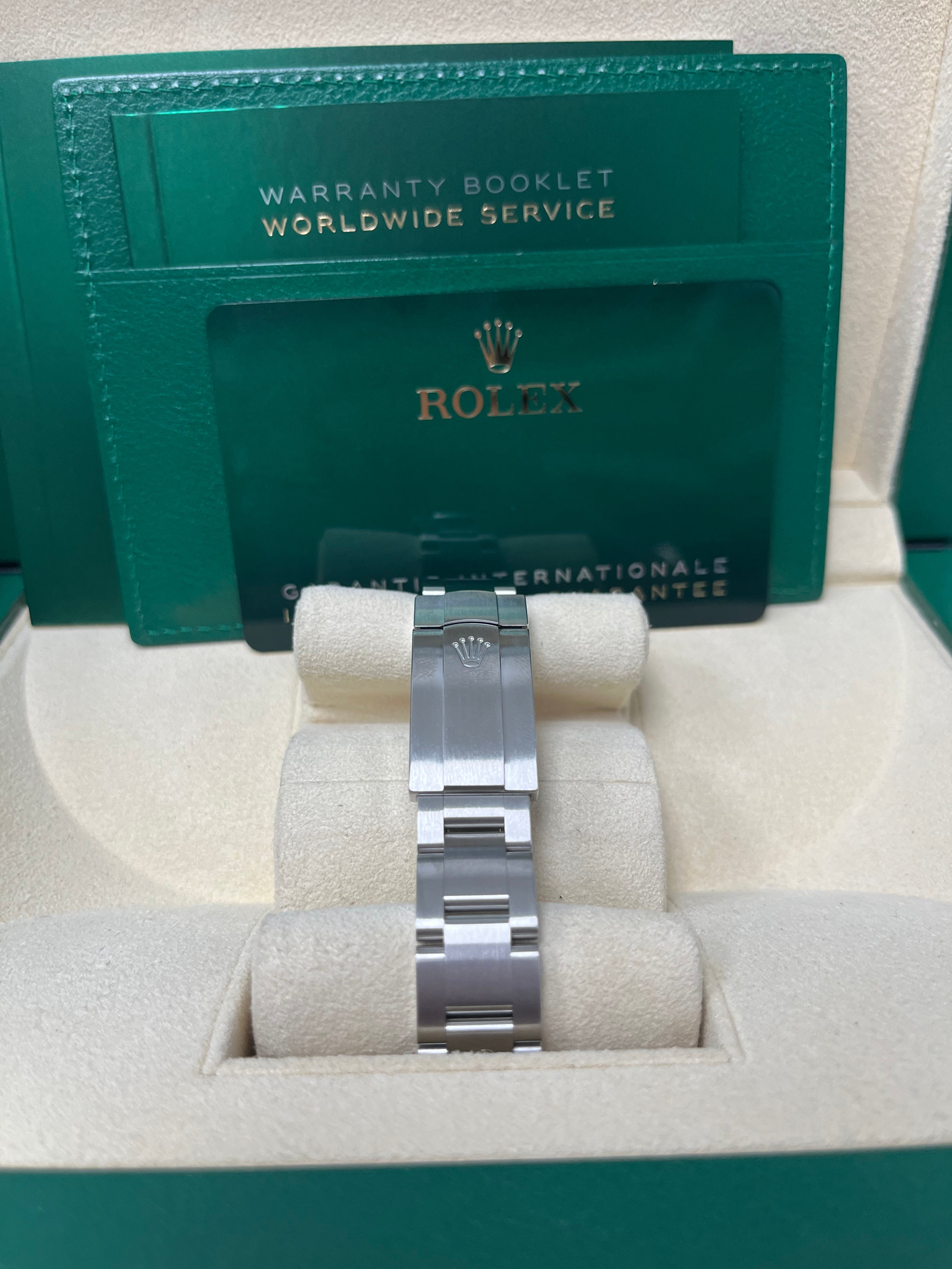 Rolex Oyster Perpetual 31mm Watch - Domed Bezel, Turquoise Blue Index Dial, Oyster Bracelet (Model 277200) | Luxury Women's Watch for Business, Parties & Special Occasions