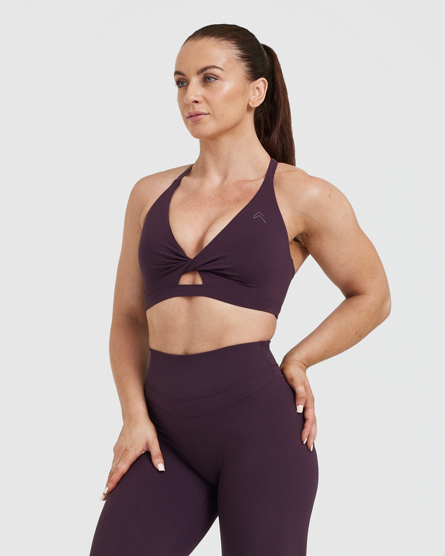 High-Performance Unified Twist Sports Bra in Blackberry Purple - Perfect for Yoga, Running & Gym Workouts