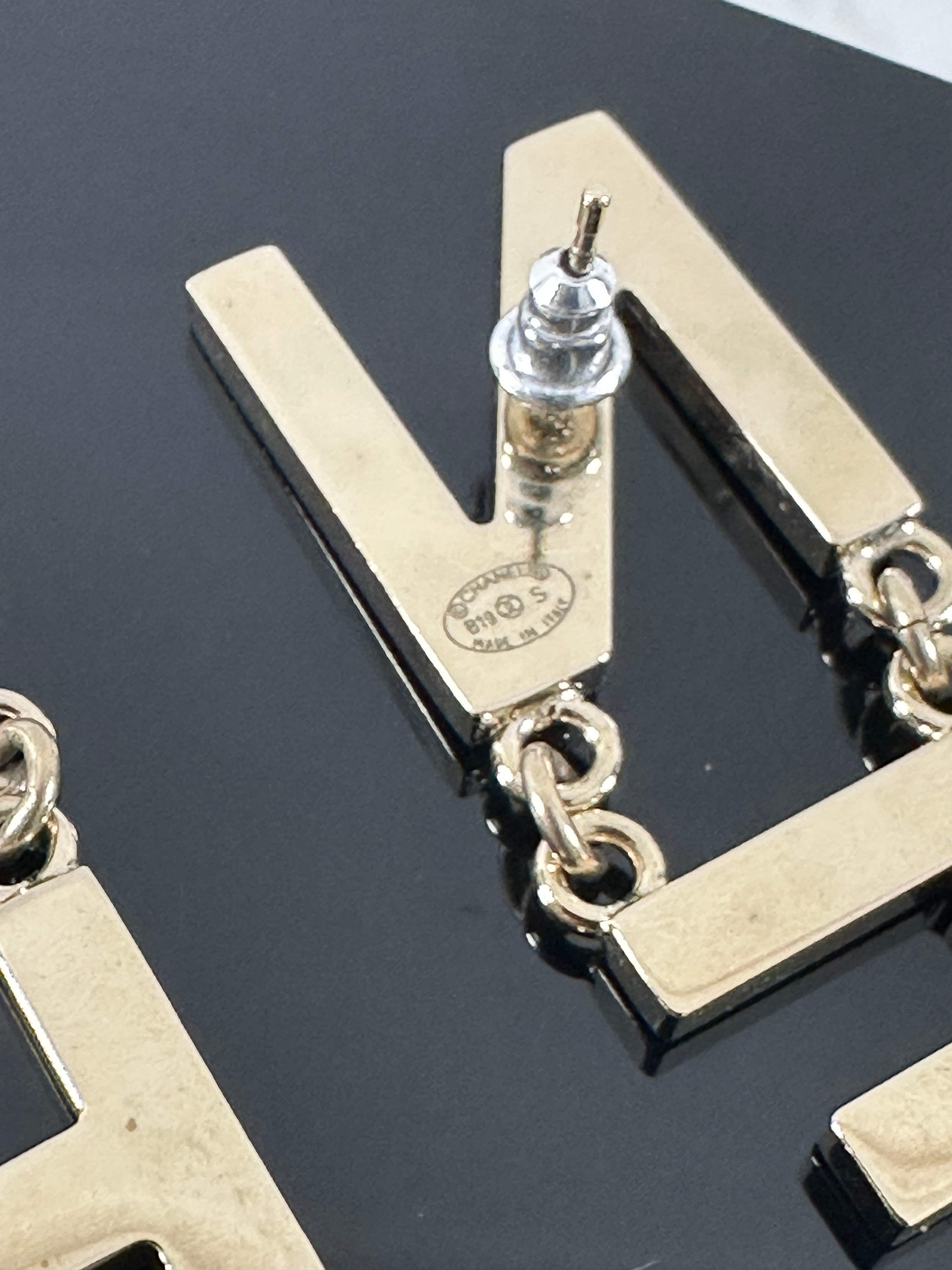 Chanel 19S Light Gold Tone Spellout Logo Drop Earrings - Elegant Dangling Earrings for Women, Perfect for Parties, Weddings & Special Occasions