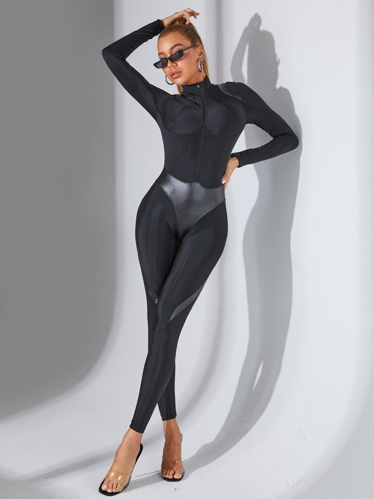 ZASUWA Women's Faux Leather Jumpsuit with Stand Collar & Zipper Detail - Stylish One-Piece Outfit for Party, Club & Night Out