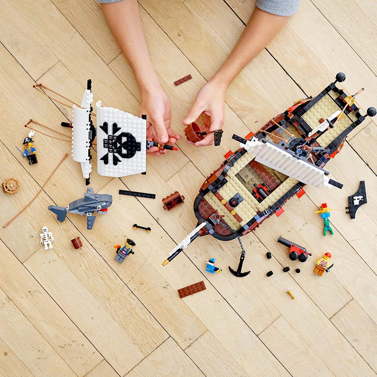 LEGO Creator 3-in-1 Pirate Ship Building Set 31109 - Buildable Toy Ship with 4 Minifigures & Shark - Convertible to Pirate Inn or Skull Island - Creative STEM Gift for Boys & Girls Ages 9+ - Perfect for Birthday Gifts, Playroom Decor & Imaginative Adventures