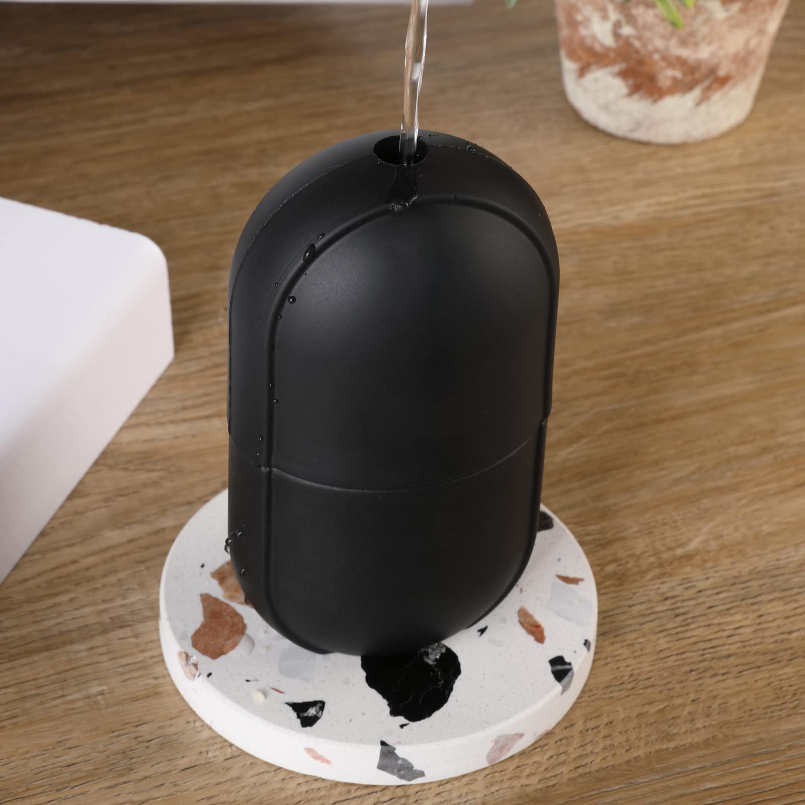 Ice Roller for Face and Eyes - Cooling Facial Massager to Brighten Skin, Reduce Puffiness & Fine Lines - Oval Black Beauty Ice Roller for Skincare & Makeup Prep - Perfect for Morning Routine & Post-Workout Recovery