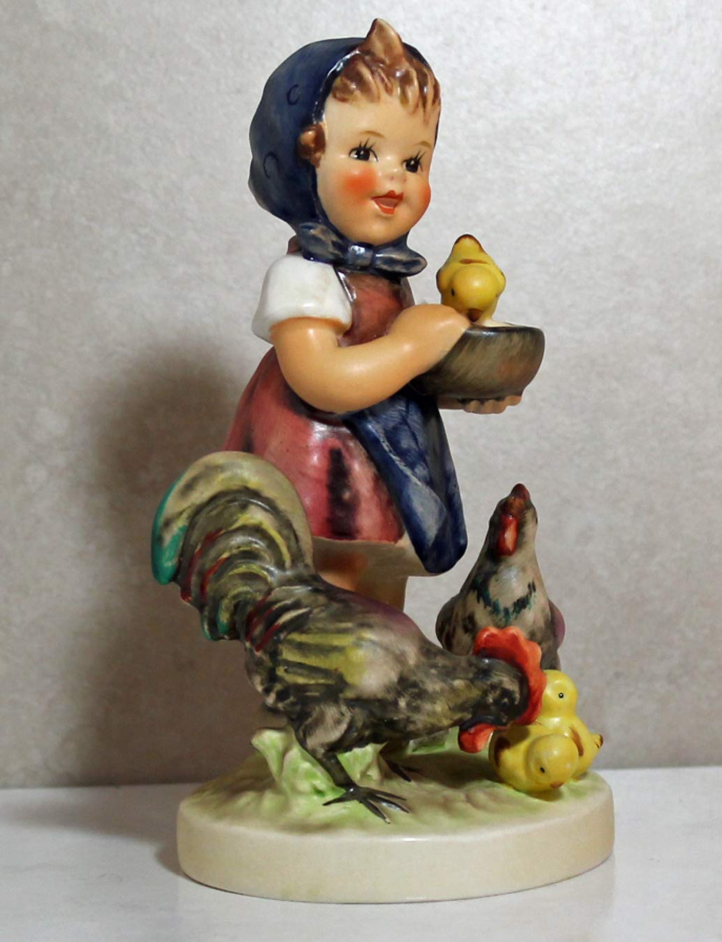 HUMMEL Feeding Time Figurine #199/I - 5.5 Inch Tall Collectible Porcelain Statue | Perfect for Kitchen Decor, Gift for Collectors & Home Display