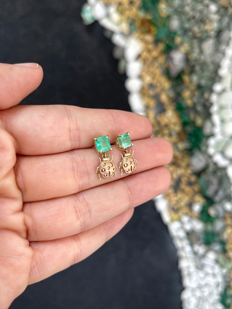 14K Rose Gold Asscher Cut Green Emerald & Lady Bug Dangle Earrings - 2.0tcw, Elegant Jewelry for Women, Perfect for Weddings, Parties & Special Occasions