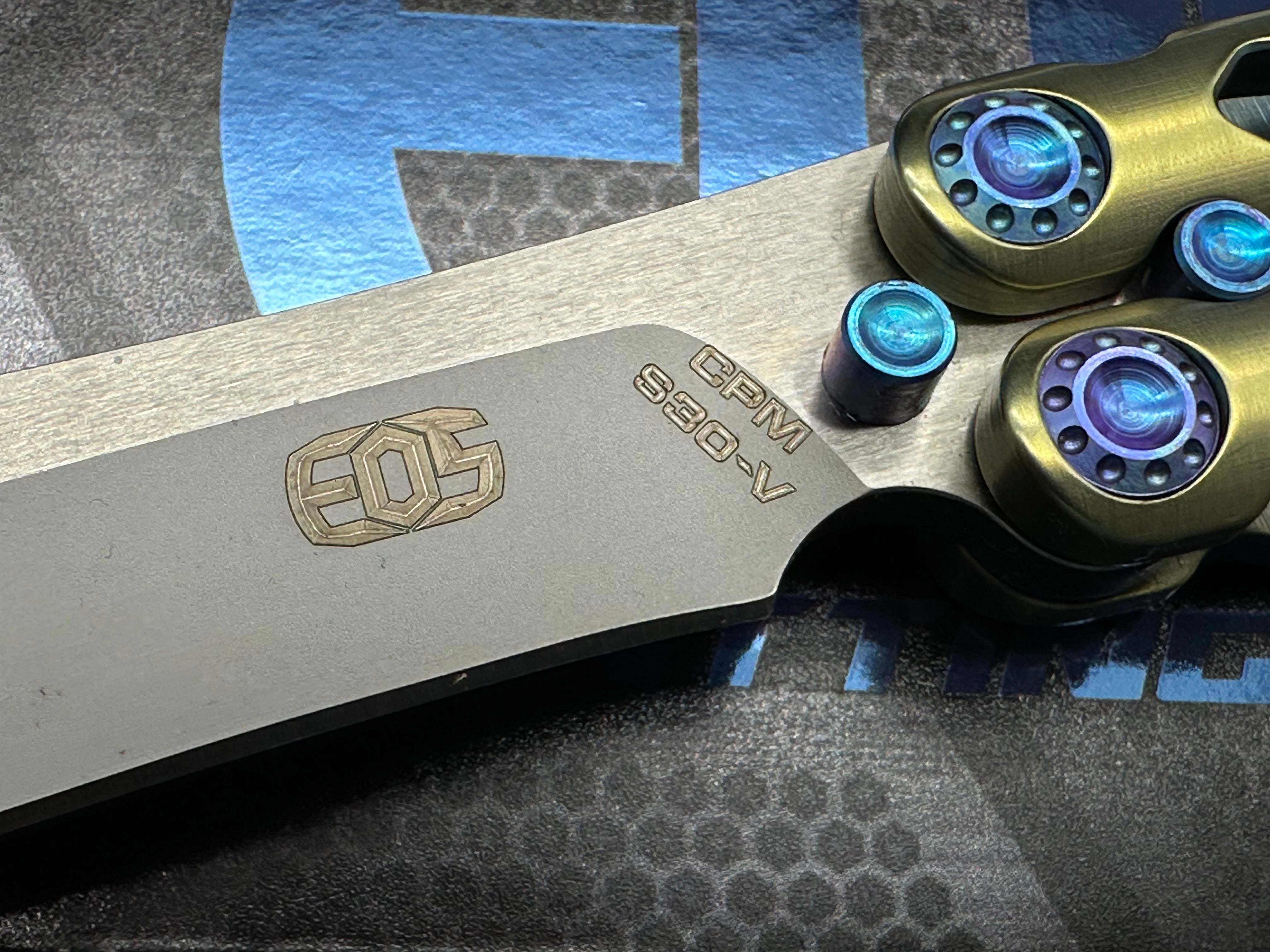 Premium EOS Villian Balisong Butterfly Knife - Gold Titanium Handles, Blue Latch Hardware, Recurve Tanto Blade in Sasha Satin CPM S30V Steel | Perfect for Collectors, EDC Carry & Tactical Enthusiasts