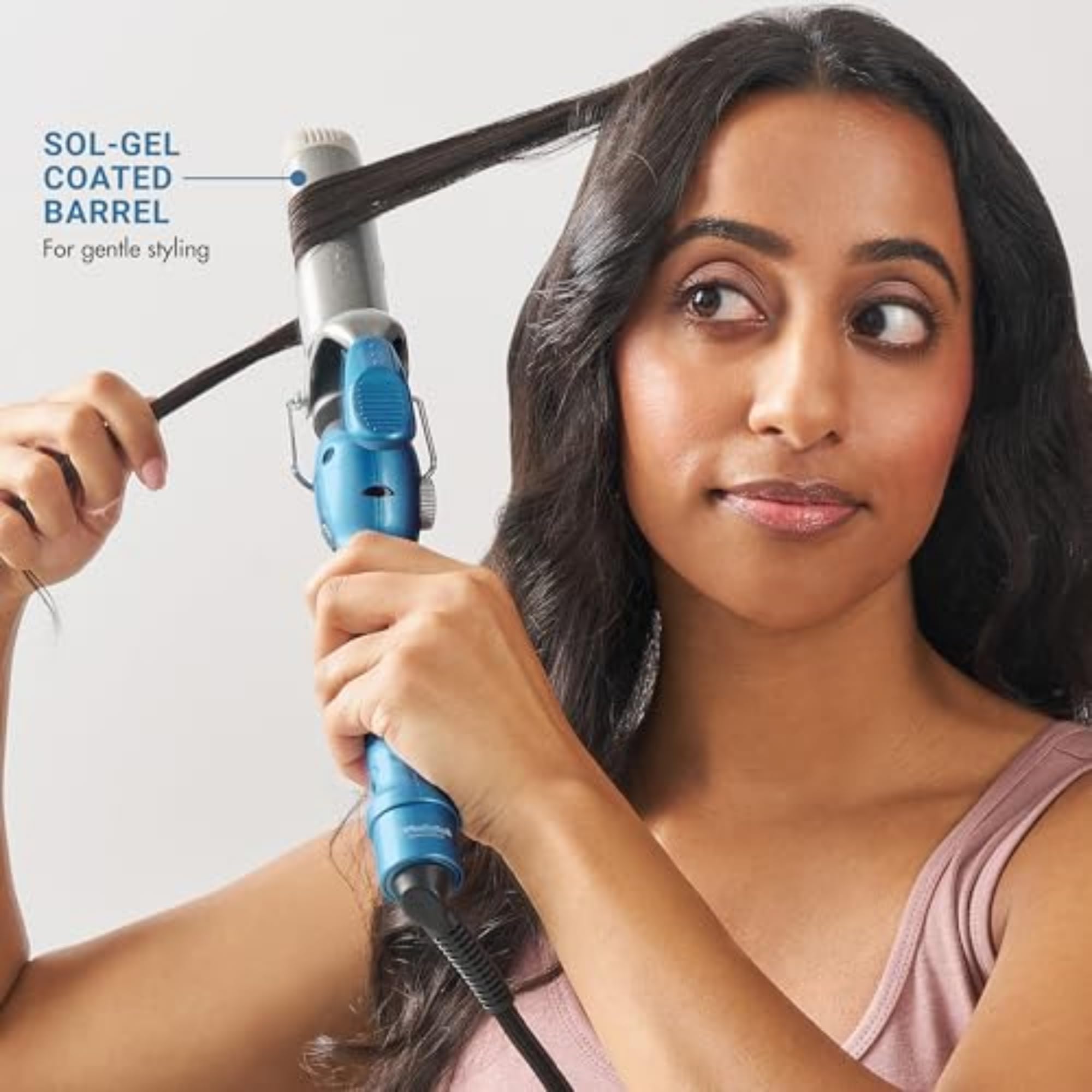BaBylissPRO Nano Titanium Professional Spring Curling Iron - 1.25 Inch Barrel for All Hair Types | Salon-Quality Curls & Waves at Home | Perfect for Daily Styling, Special Occasions & Professional Use