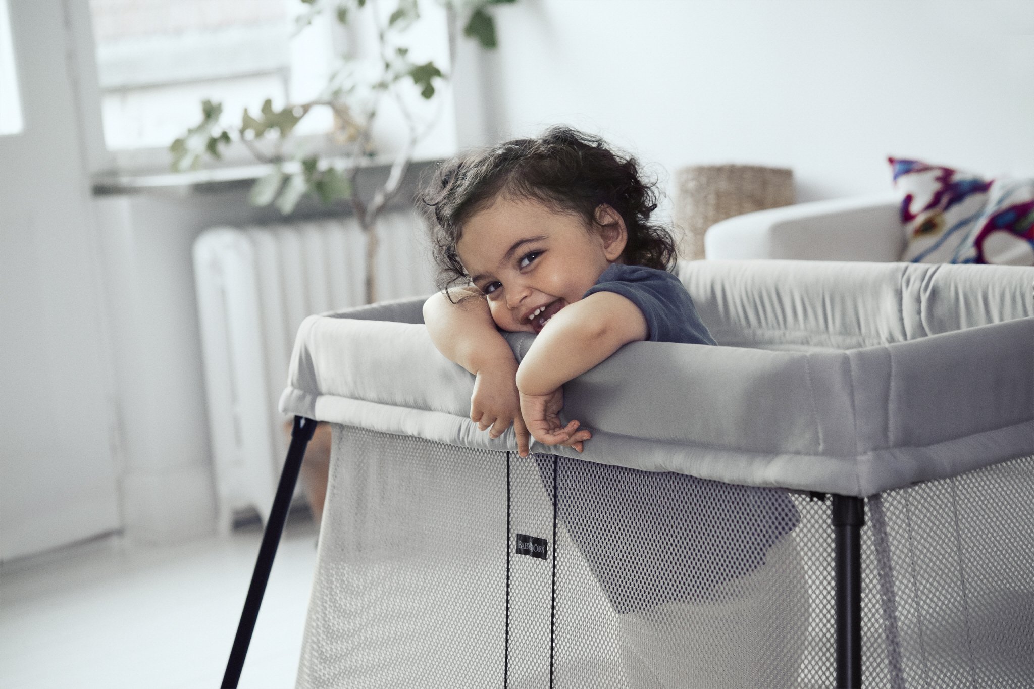 BabyBjorn Travel Crib Light - Portable Baby Bed with Fitted Sheet, Silver | Compact Foldable Design for Travel, Home & Nursery Use