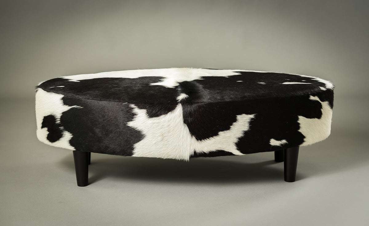 Premium Cowhide Ottoman with Oval Wooden Legs - 47