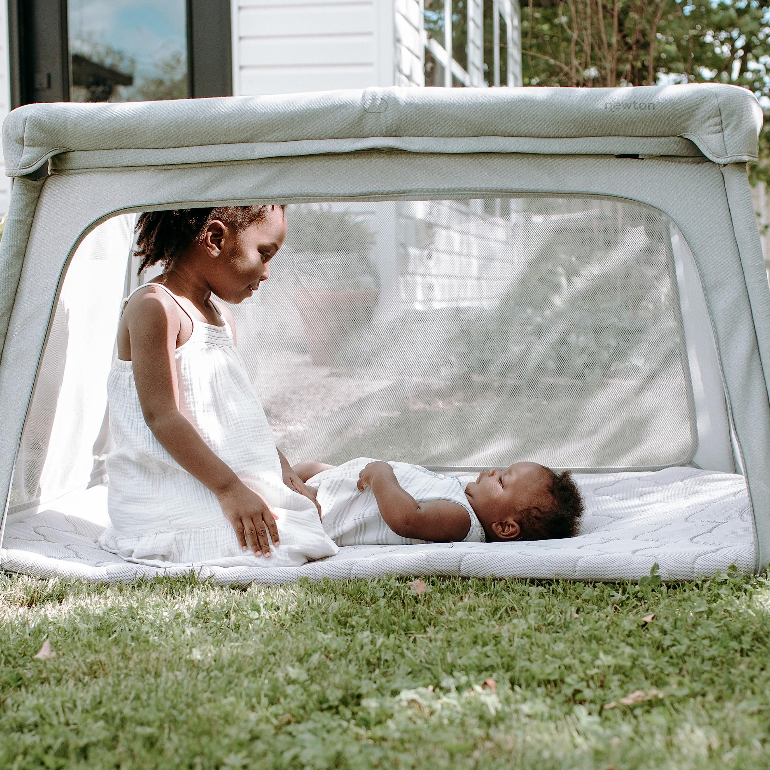 Newton Baby Travel Crib & Play Yard - 2023 Model | 100% Breathable Washable Portable Playpen | Largest Baby Playard with Travel Bag & Sheet | Bassinet Option | Perfect for Travel, Nursery & Indoor Playtime