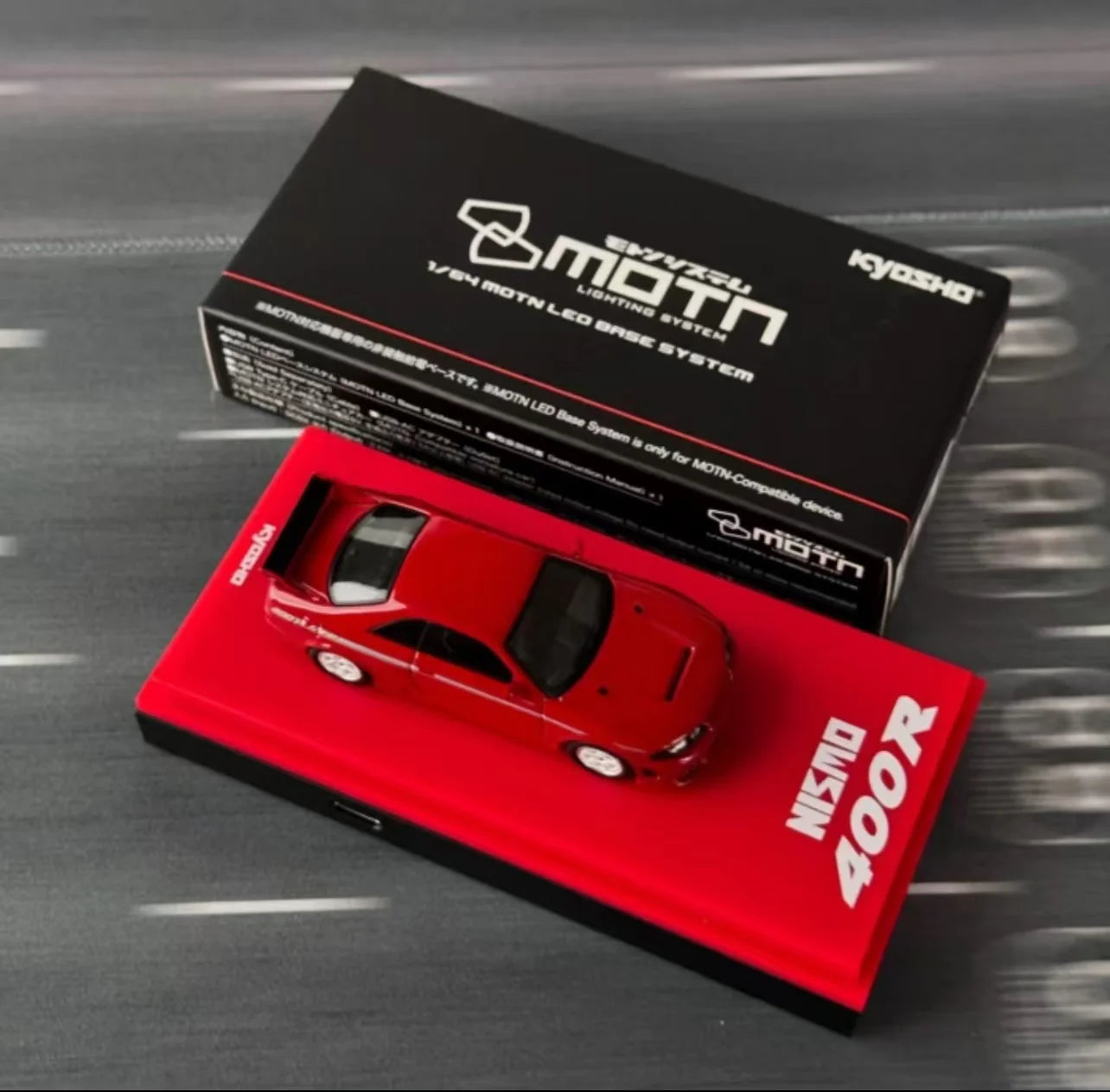 Kyosho 1:64 Scale Nissan Nismo 400R Tokyo Auto Salon KL Edition Diecast Model Car - Red (MOTN LED Base Compatible) - Perfect for Collectors, Display Cases & Racing Enthusiasts