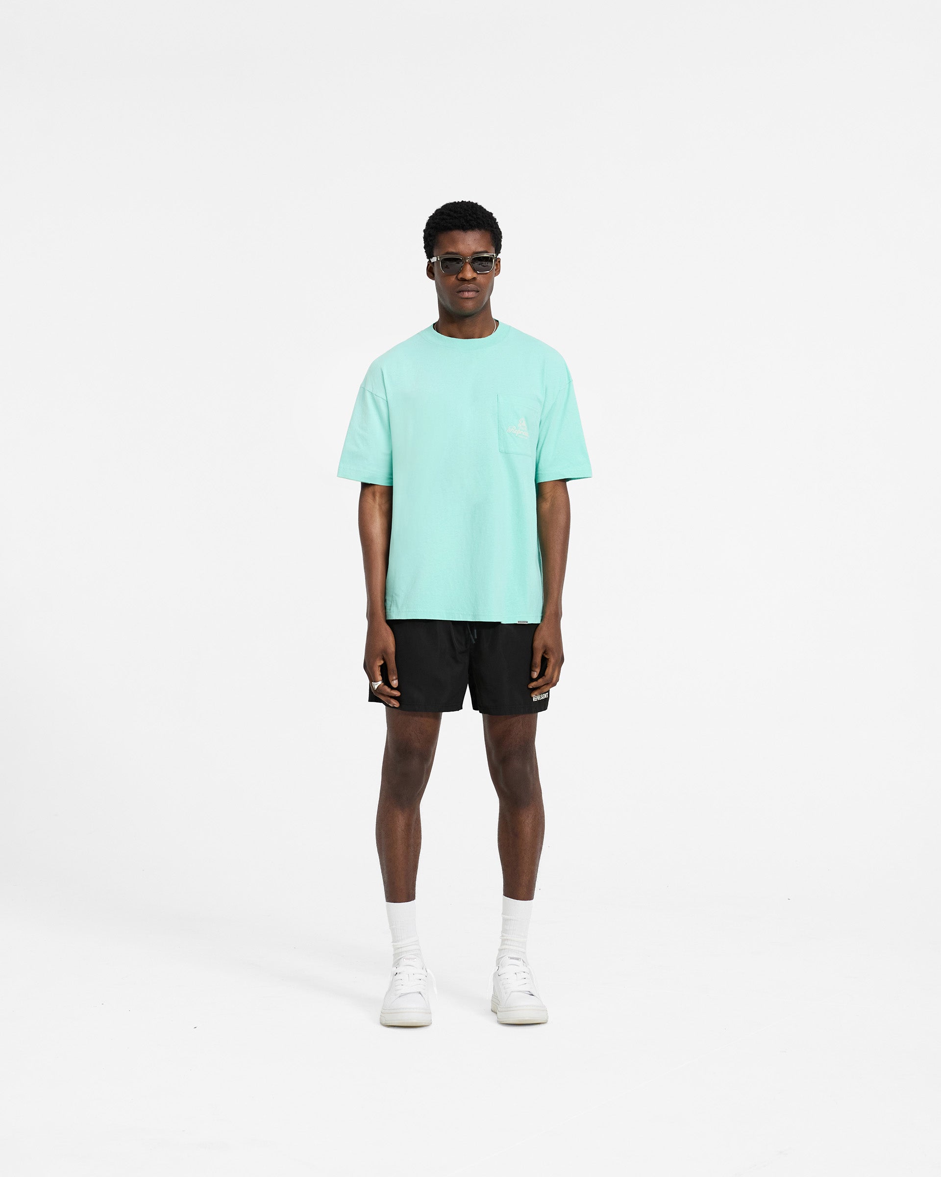 Permanent Vacation Pocket T-Shirt - Electric Mint Green | Casual & Comfortable Cotton Tee for Men & Women | Perfect for Travel, Beach & Everyday Wear