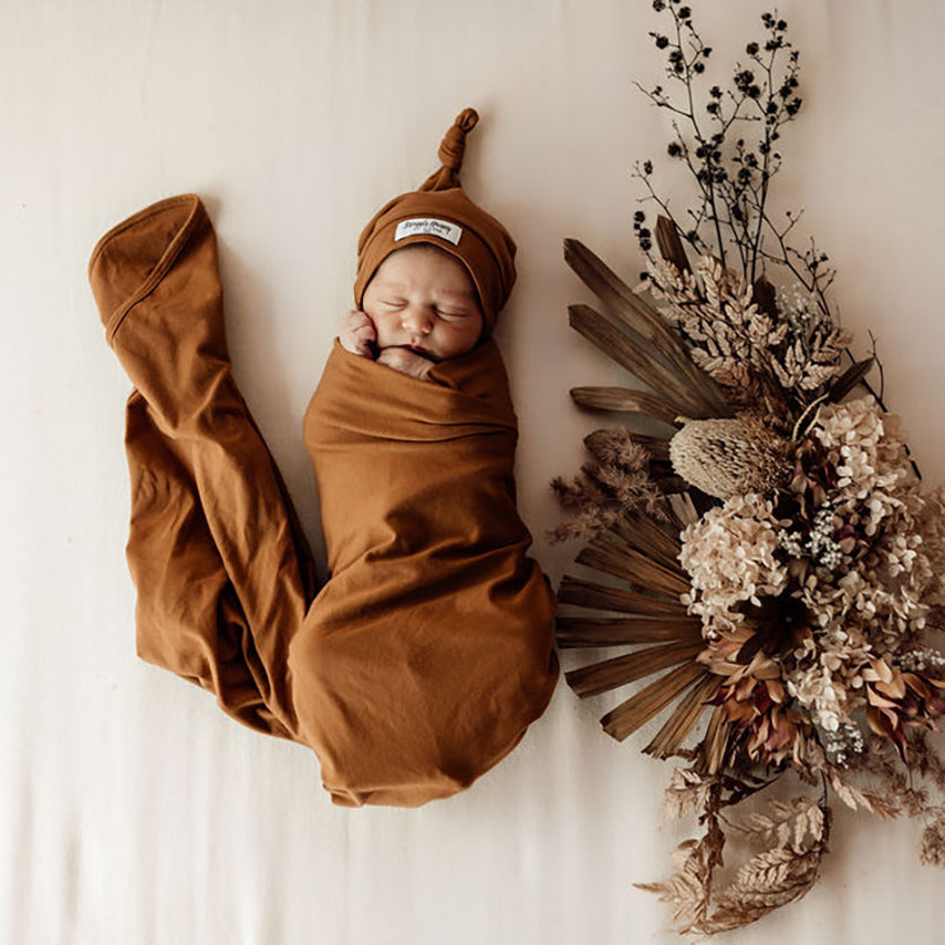 Snuggle Hunny Baby Jersey Wrap & Beanie Set - Soft Cotton Newborn Swaddle Blanket and Hat - Perfect for Hospital Photos, Baby Showers & Cozy Nursery Time (Bronze)
