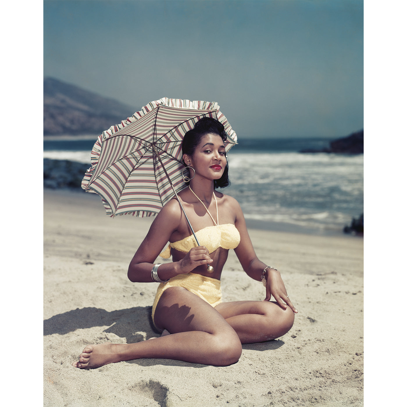 Woman Holding Umbrella on Beach - Premium Stock Photo from Getty Images | Perfect for Travel Blogs, Summer Campaigns & Vacation Advertising
