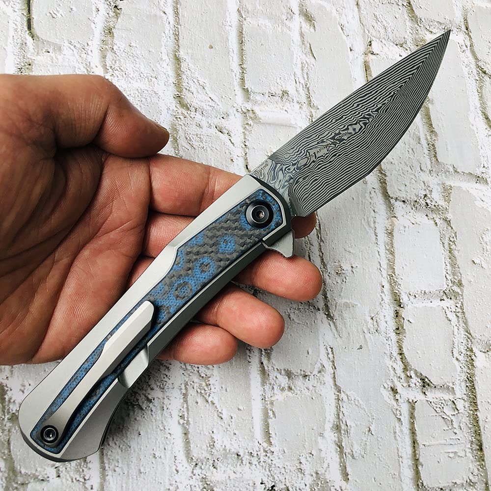 Kansept Kratos Damascus Folding Pocket Knife - 8.69in Titanium Handle with Blue Black Fat Carbon Fiber Inlays, 3.79in Clip Point Blade - EDC, Outdoor, Hunting, Camping, Survival Gear - Perfect for Everyday Carry, Bushcraft & Tactical Use