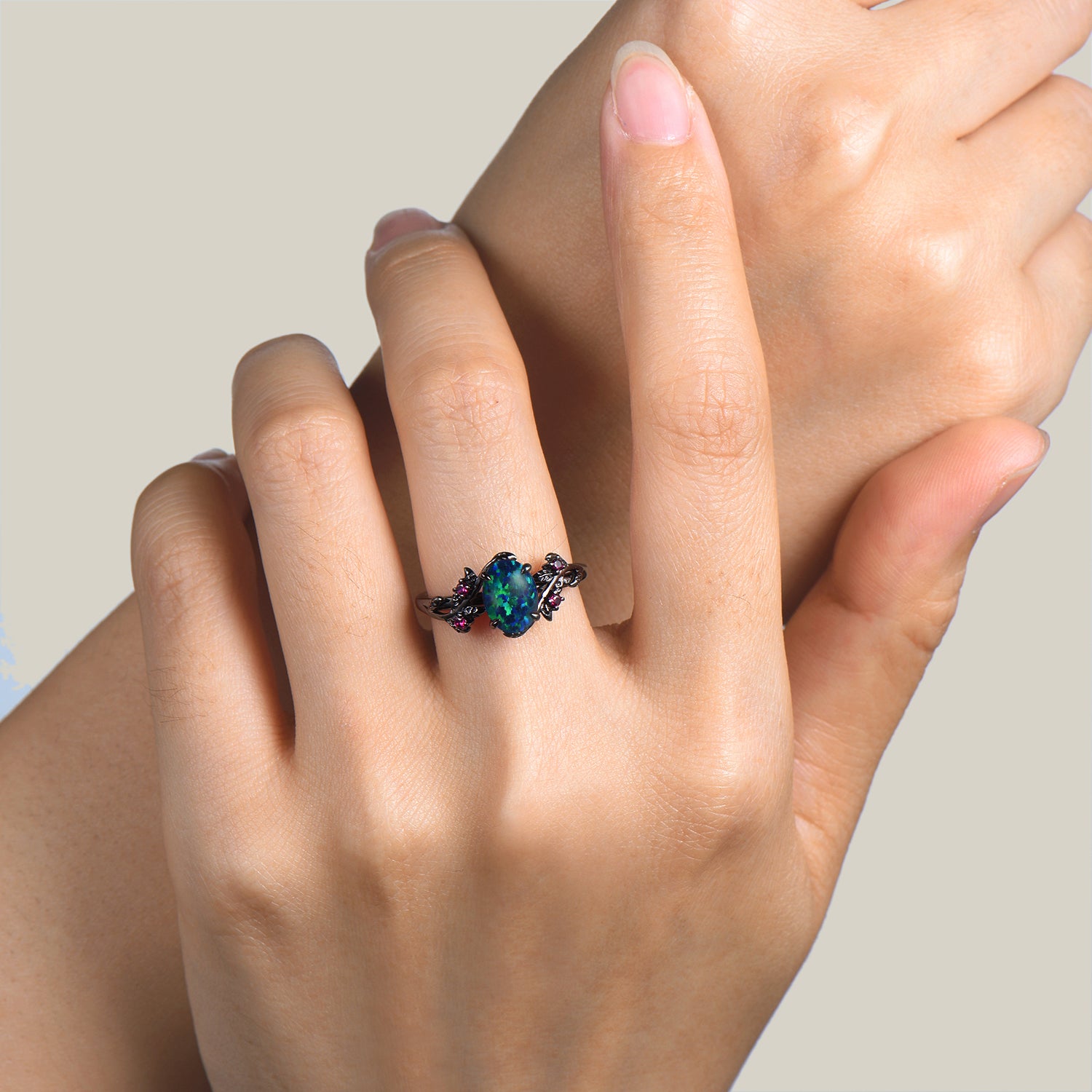 Oval Cut Black Opal Engagement Ring with Ruby Leaves in Black Gold - Nature Inspired Wedding Band for Women, Perfect for Proposals, Anniversaries & Romantic Occasions