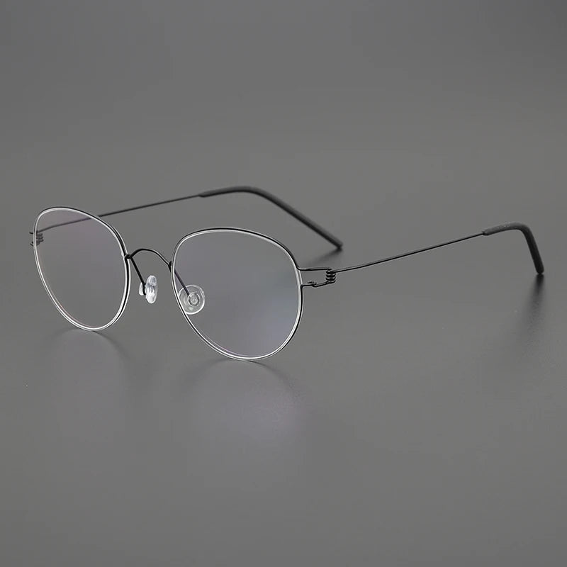 Stylish Black Titanium Oval Full Rim Screwless Eyeglasses for Women - Perfect for Work, Reading & Everyday Fashion