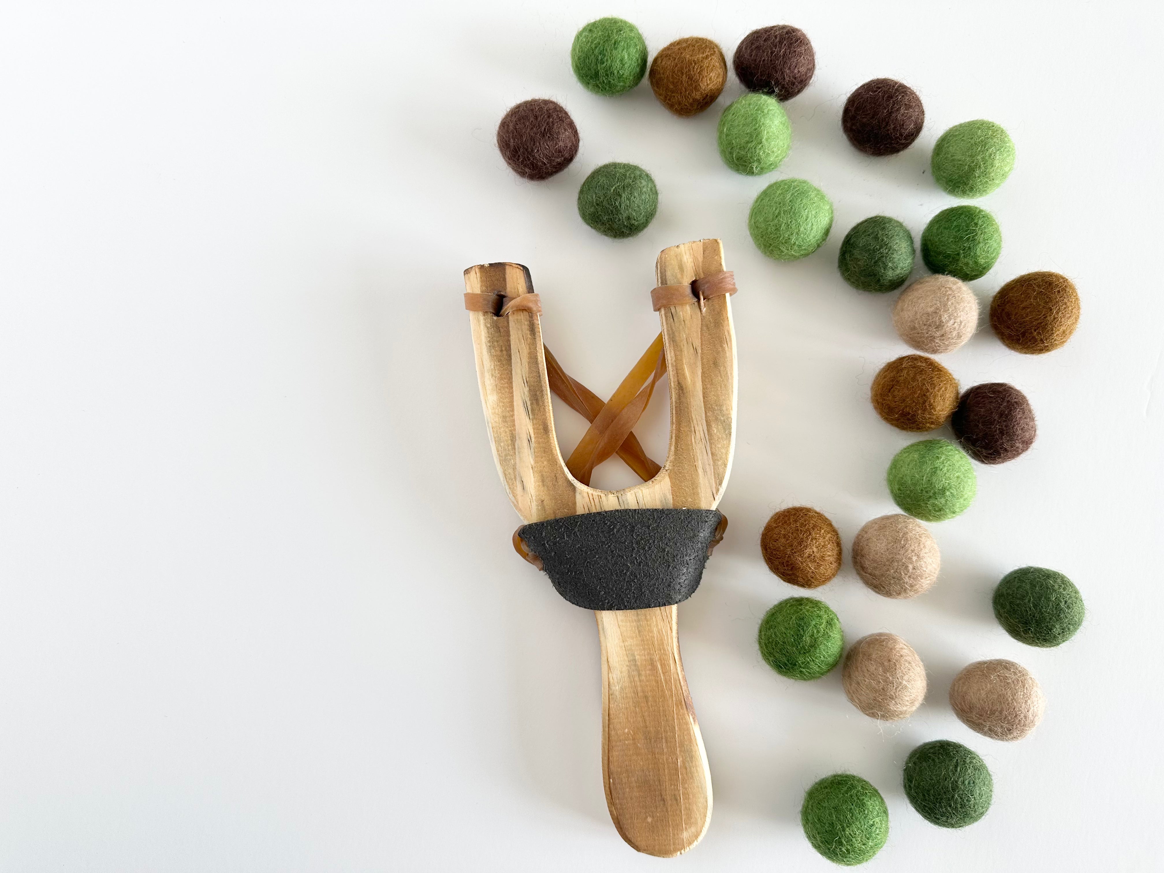 Professional Camouflage Slingshot with 50 Felt Balls - Outdoor Hunting Gear for Survival Training & Small Game Hunting | Perfect for Camping, Backyard Target Practice & Wilderness Adventures